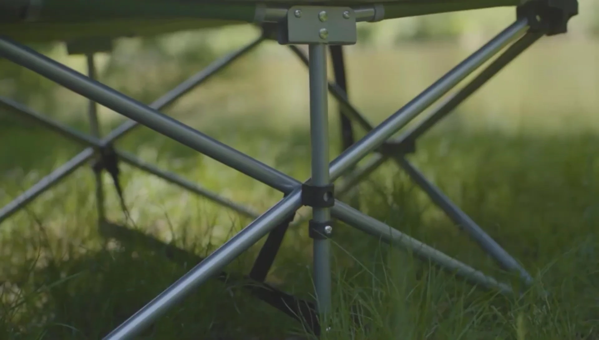 Highlighting the lightweight and portable aspect of the cot