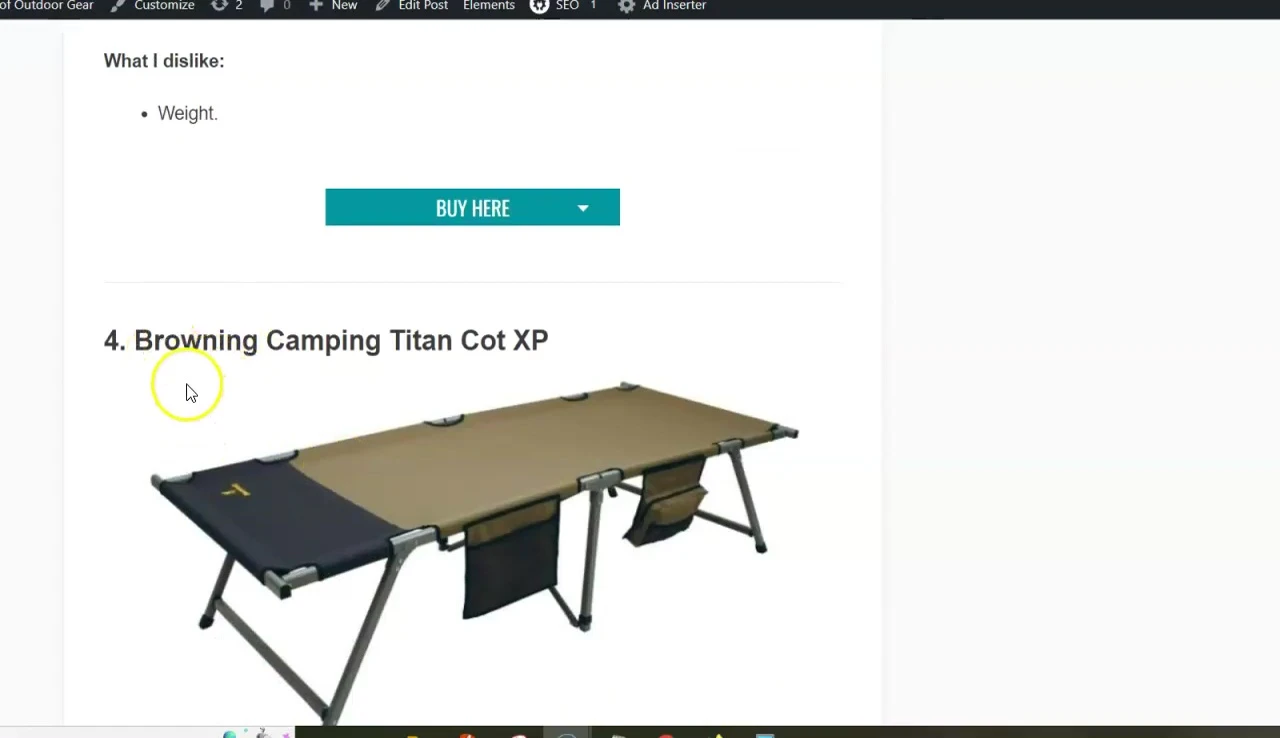 A cot with a military-style design and uniquely positioned legs.