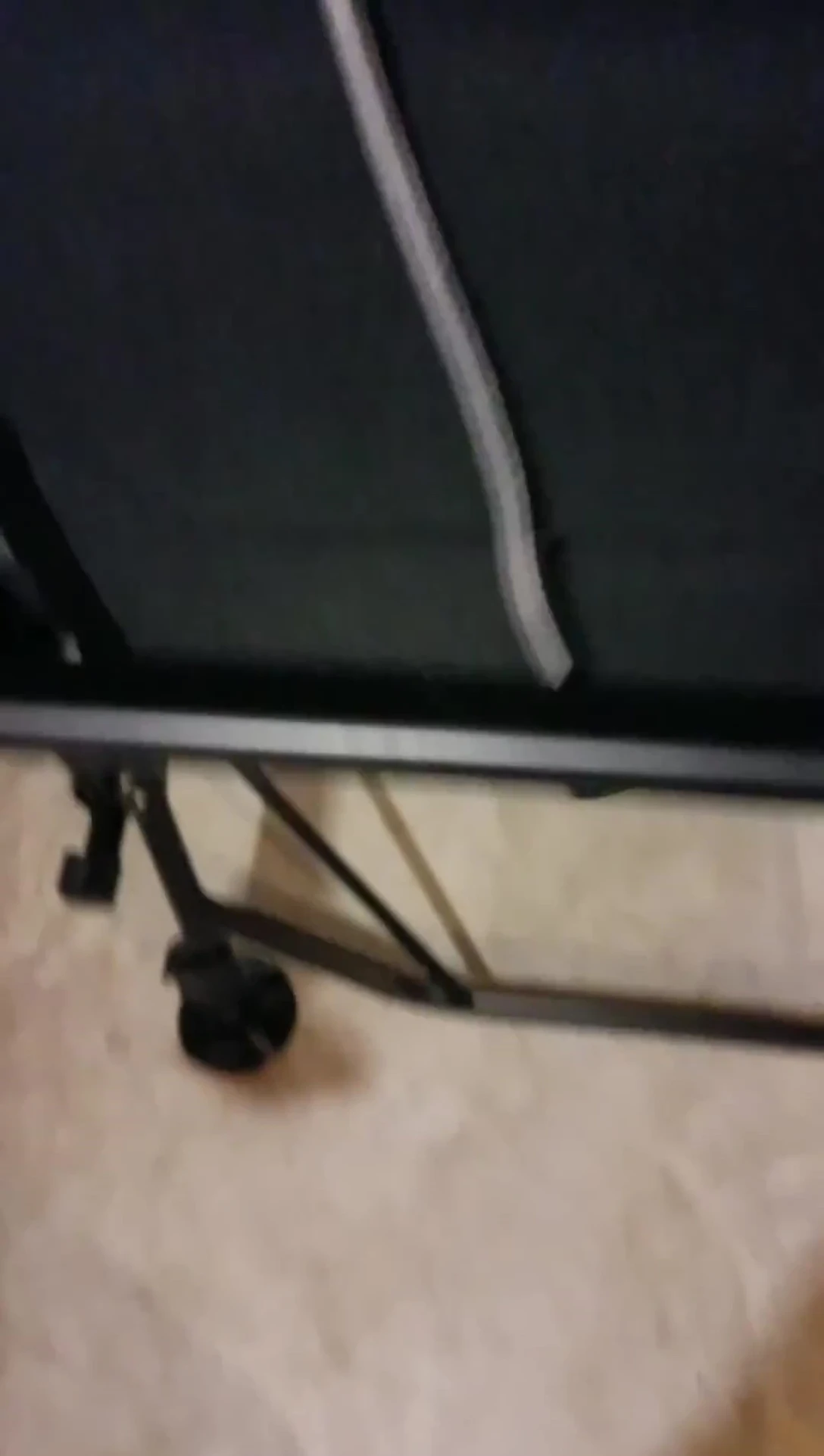 Attaching bungee cords to the underside of the cot foot