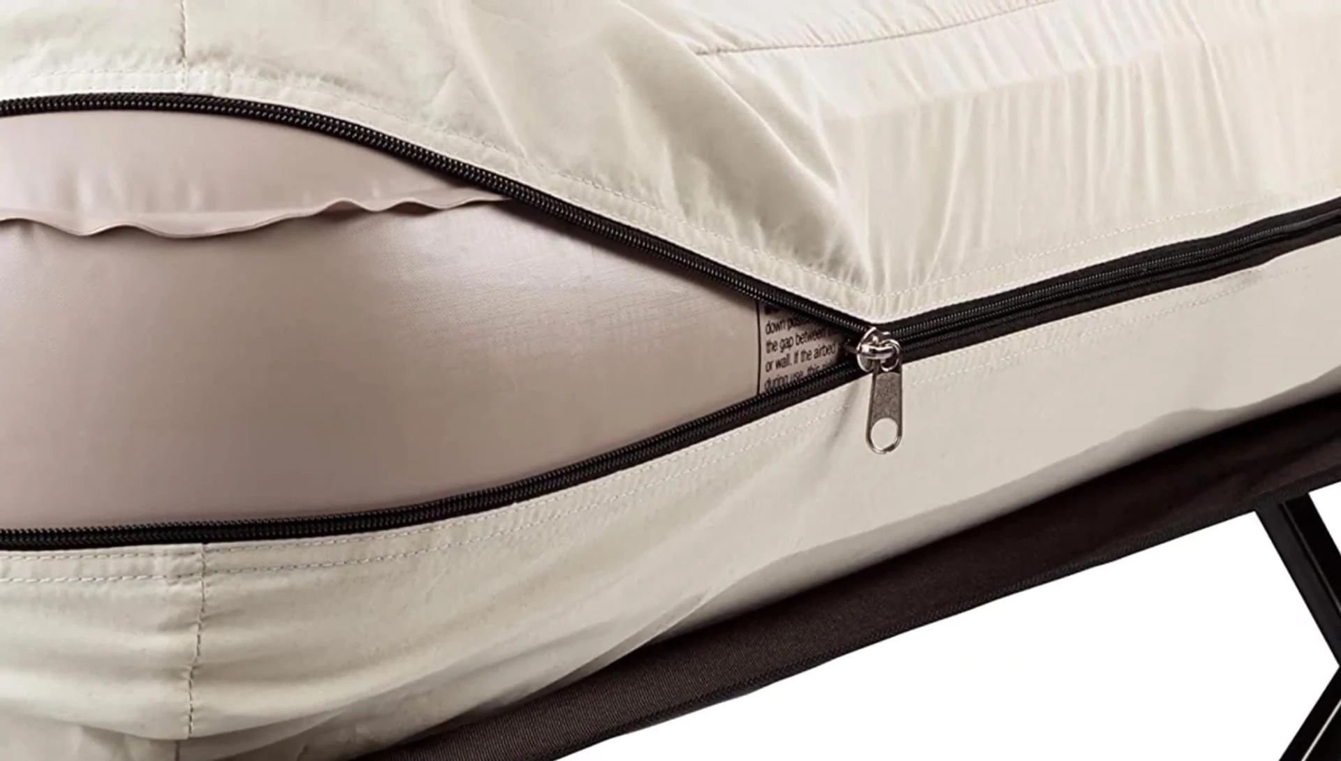 Coleman camping cot being set up
