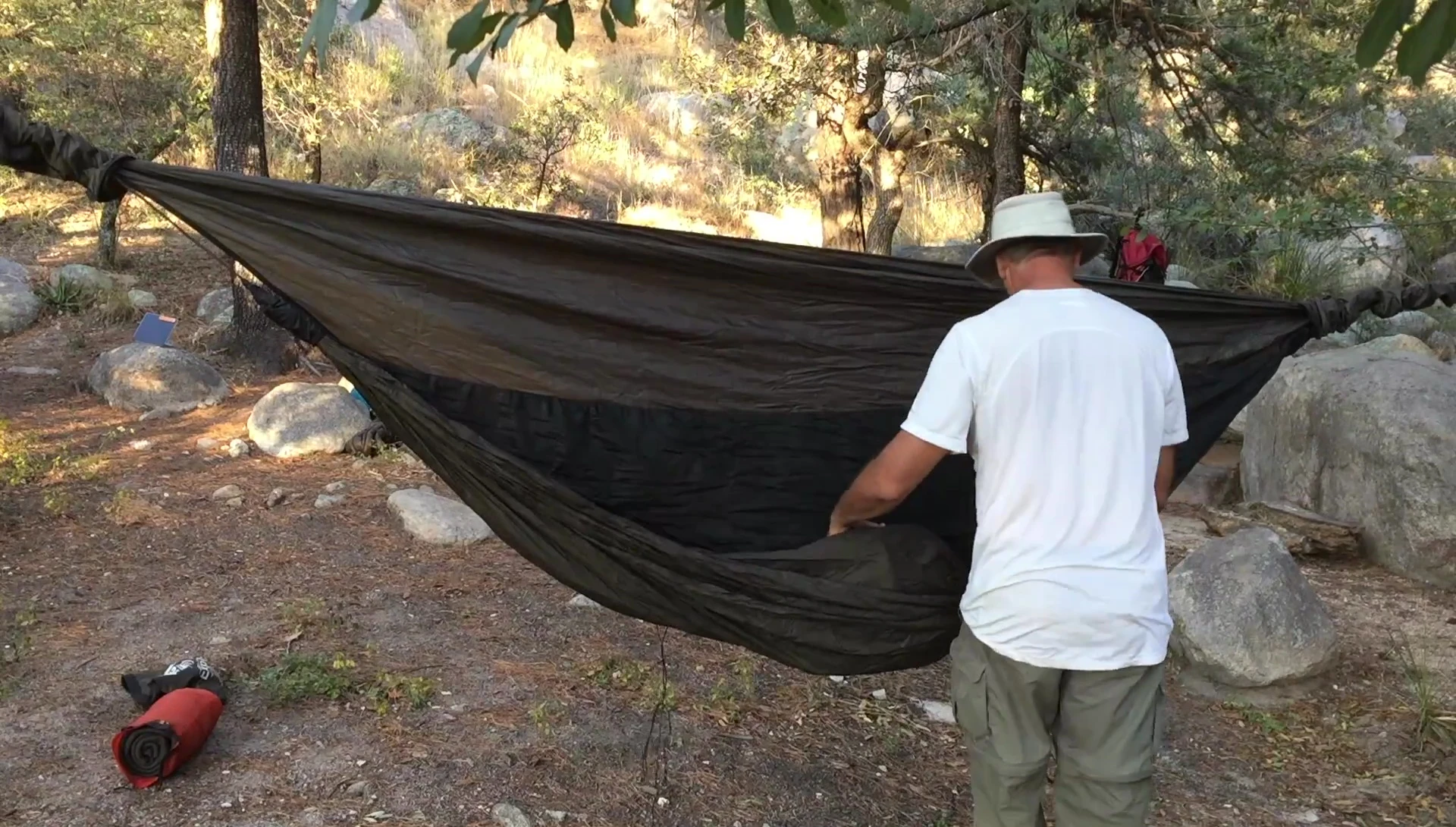 Demonstrating how easily the Radiant Double Bubble Pad can be inserted into the hammock
