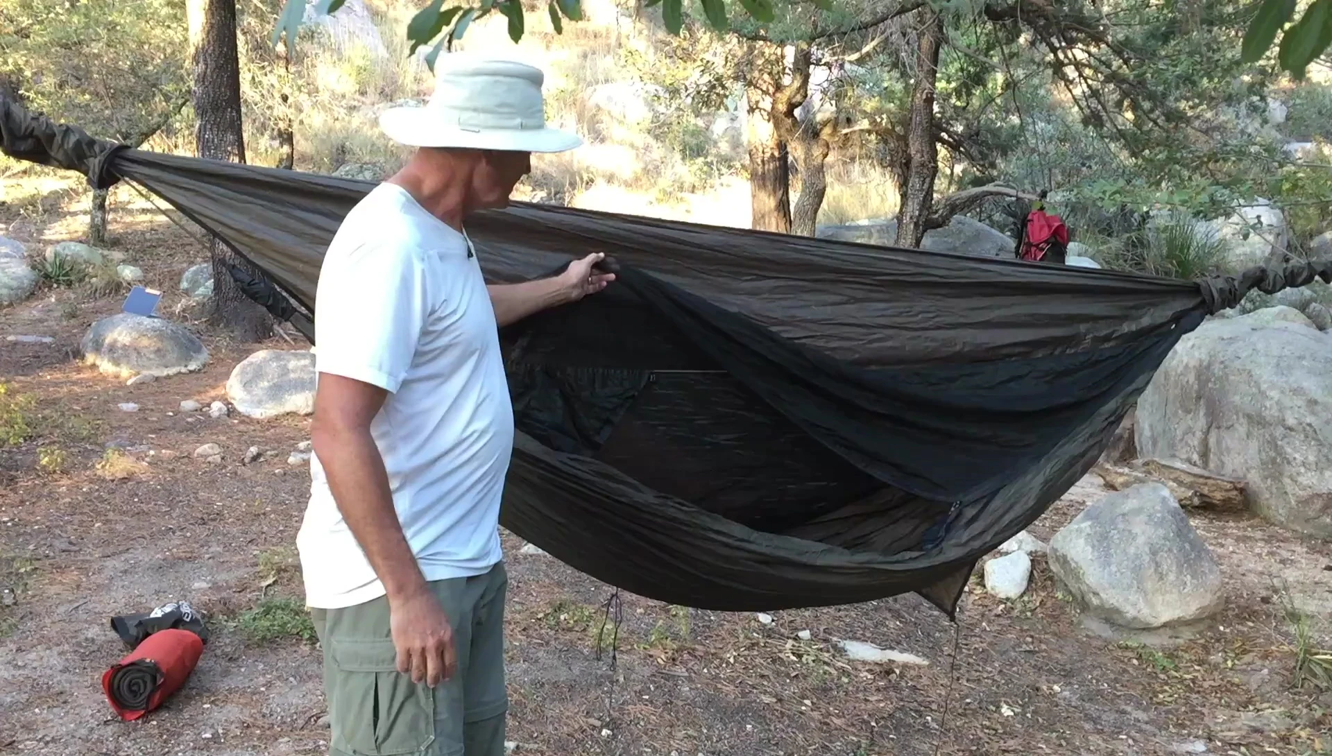 The reviewer in their Hennessy hammock after a night's sleep