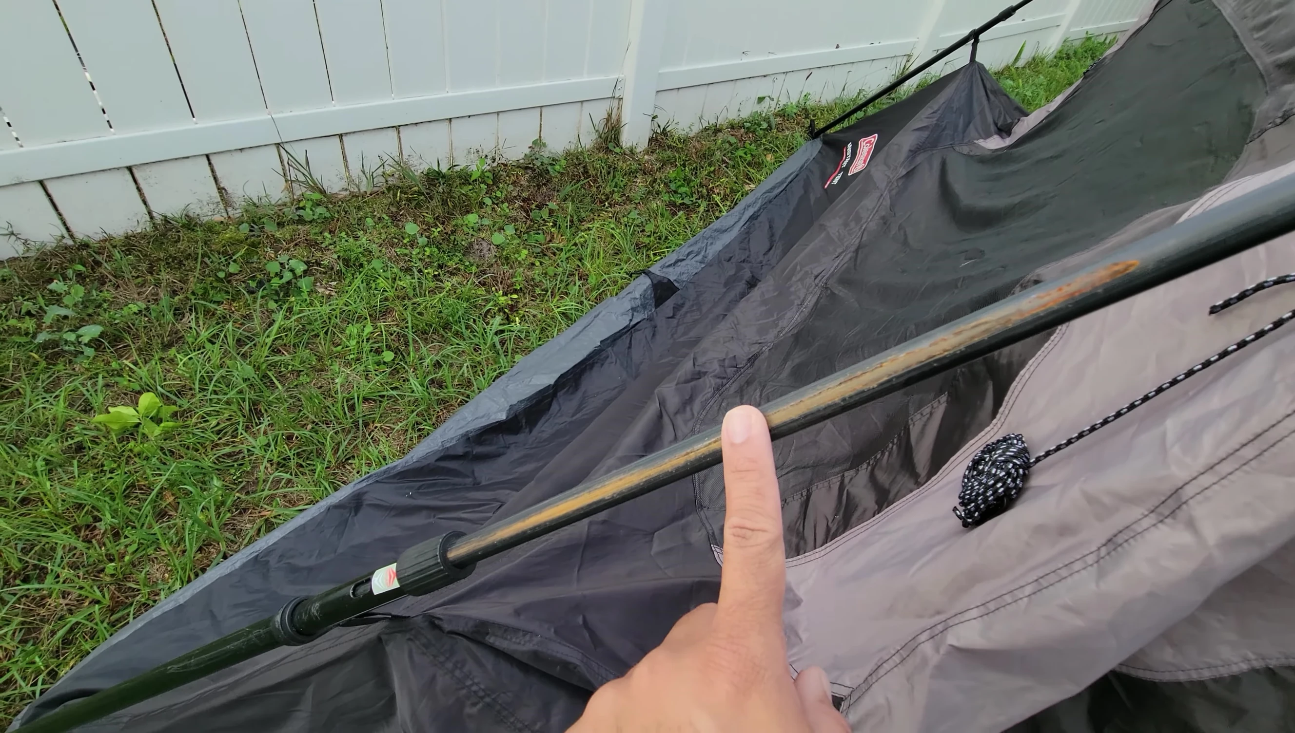 The reviewer points out rust on the tent's joints, suggesting the use of WD-40 for smoother packing.