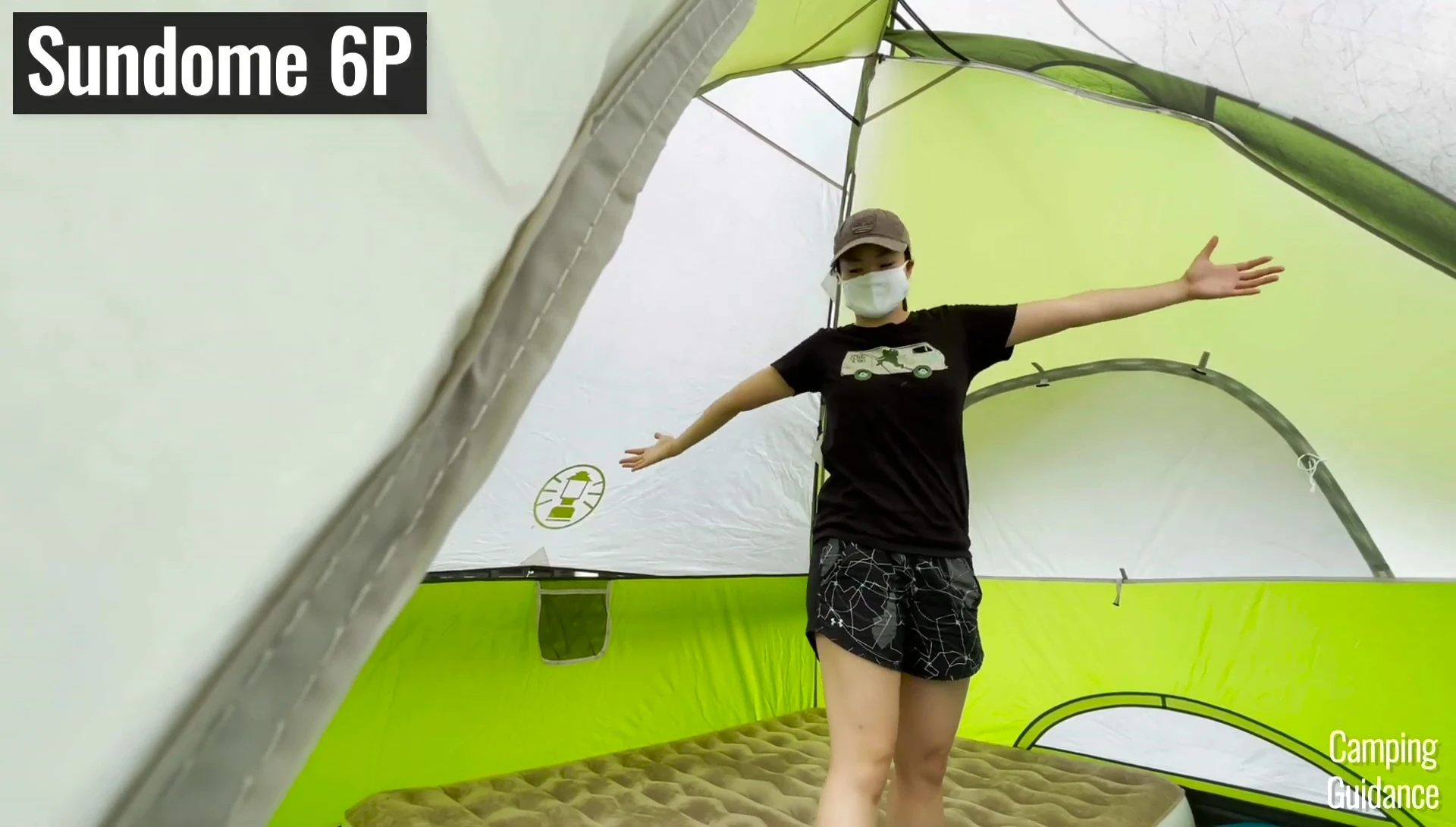 The narrator inside the 6-person Sundome tent, highlighting the space.