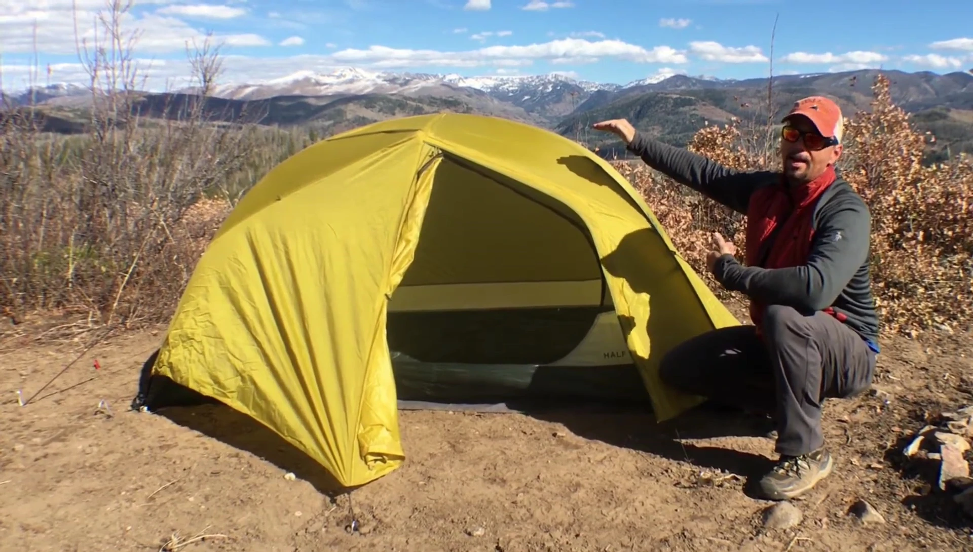 Person sitting comfortably inside the tent