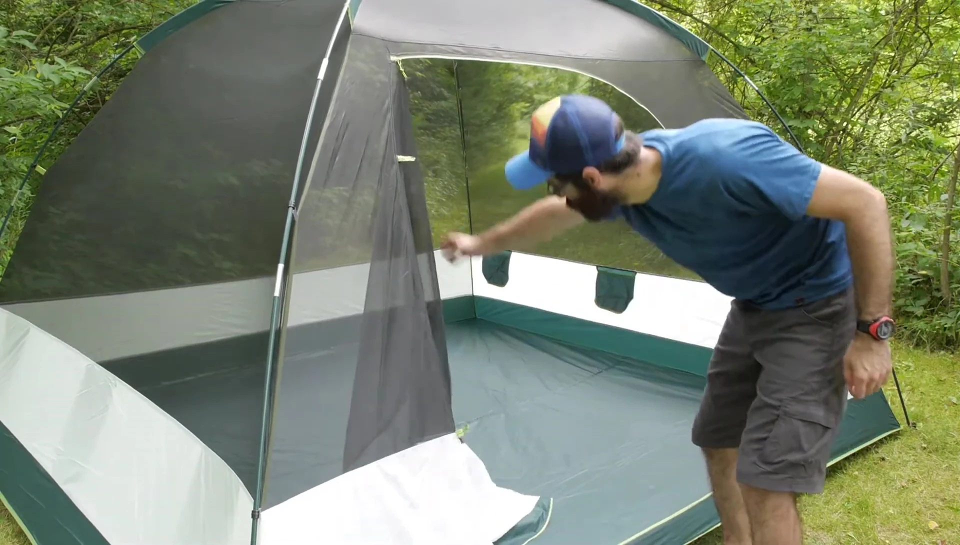 Person standing upright inside the tent.