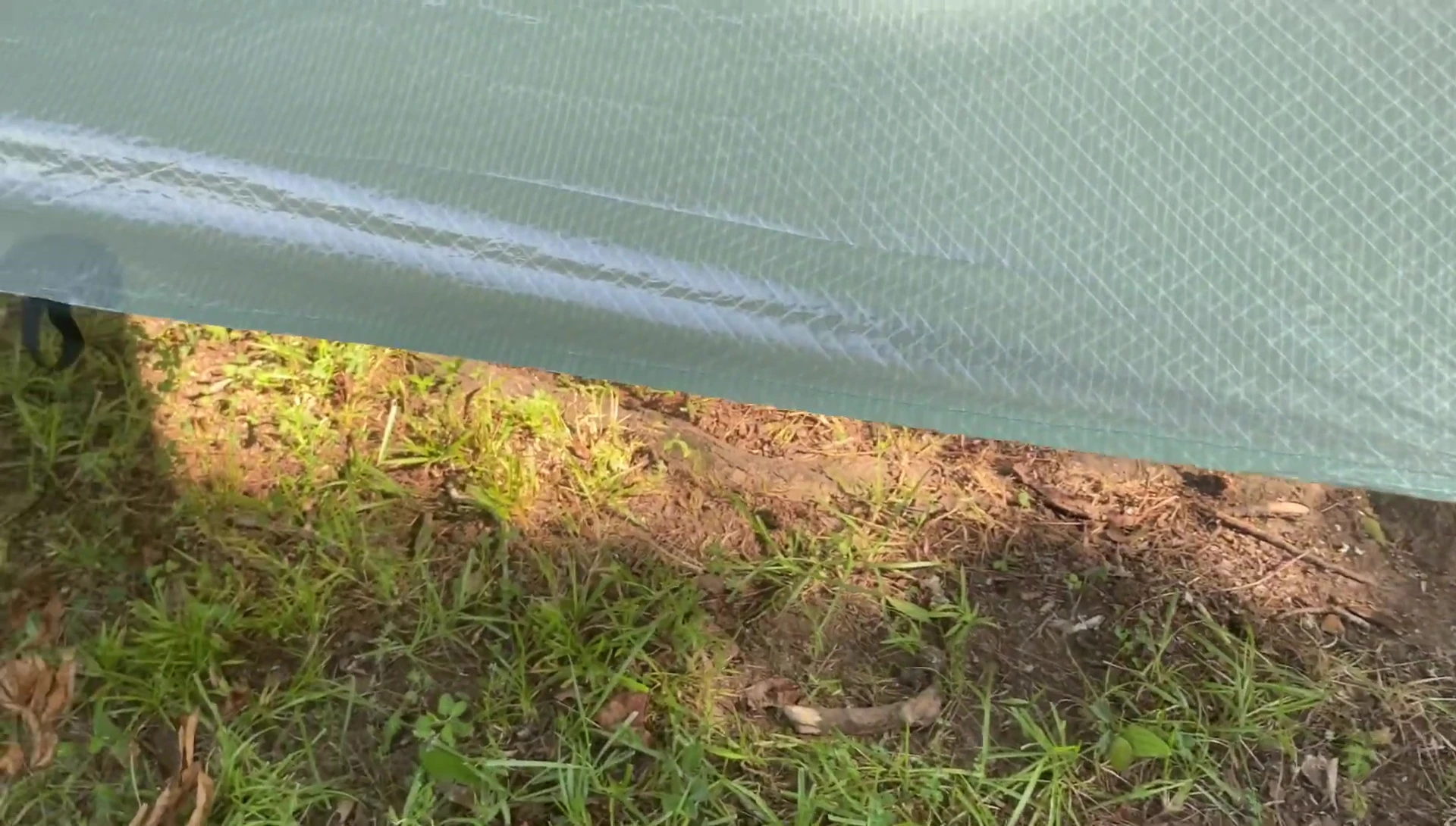 Showing the multiple tie-out points on the tarp