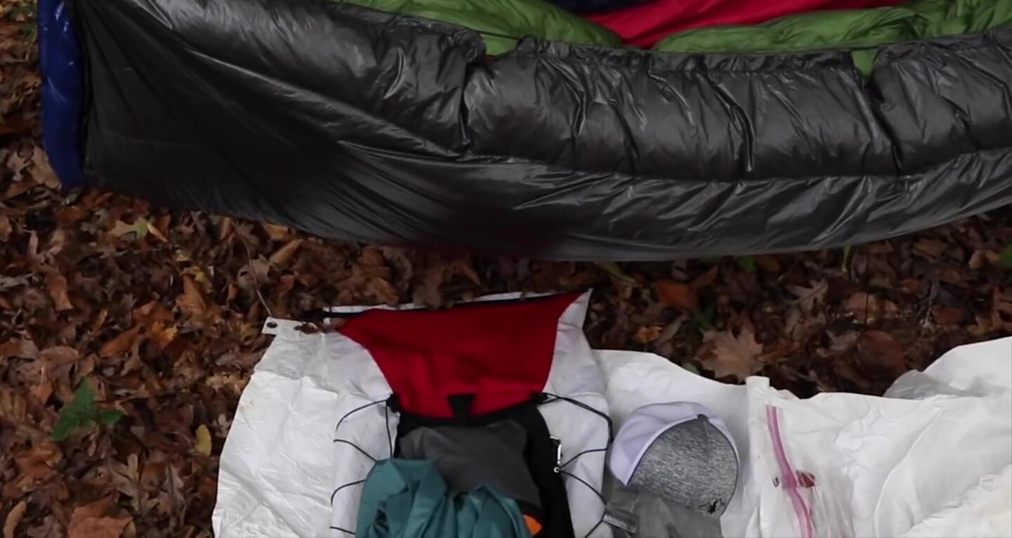 Limited gear storage space visible under a hammock.