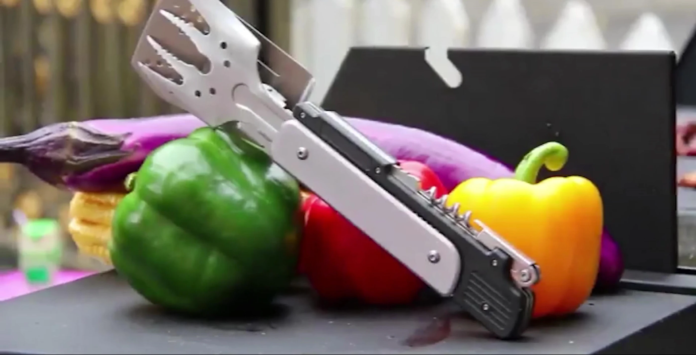 Leech Amp 6-in-1 BBQ Multi-Tool unfolded, showcasing all tools.