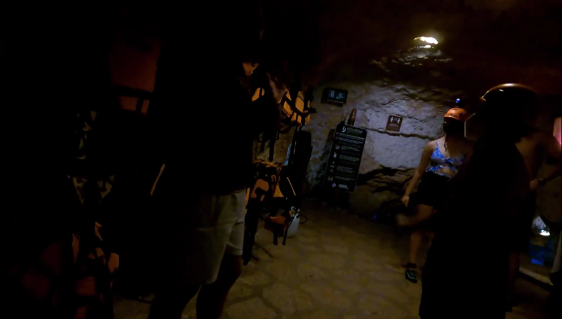 People navigating the underground river.