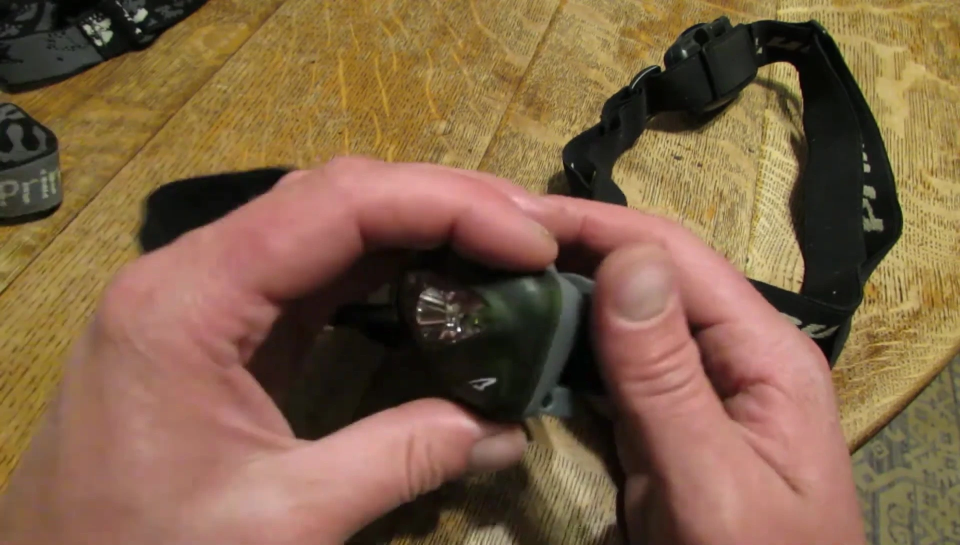 The presenter recommends the Princeton Tec Vizz headlamp as a superior alternative.
