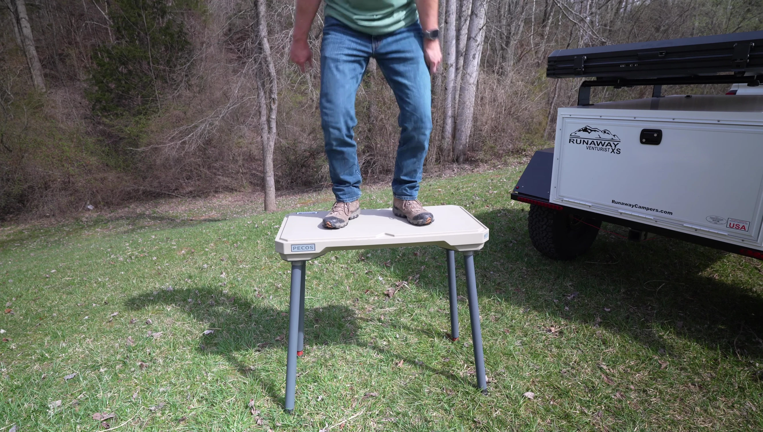 The reviewer standing on the table.