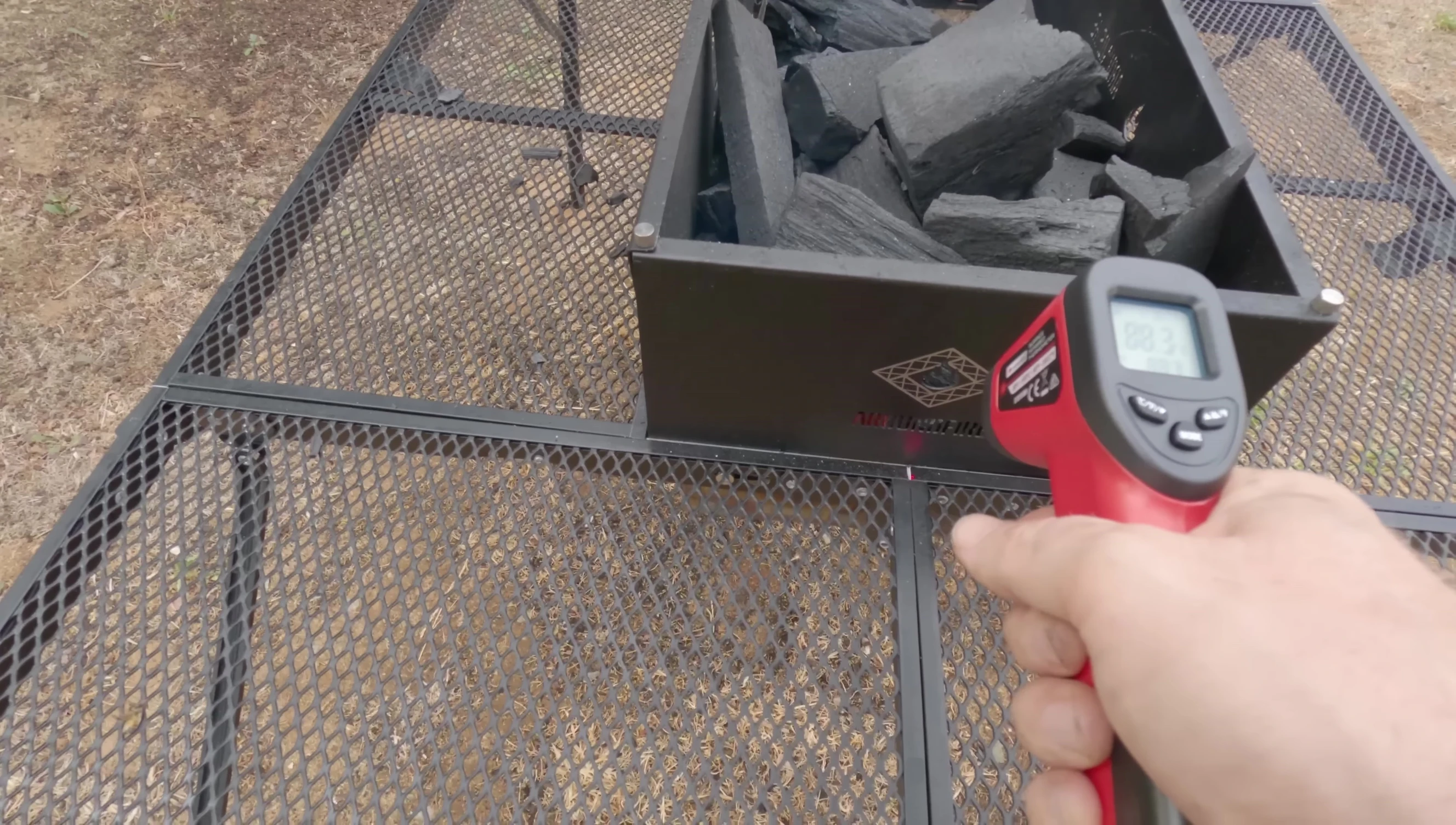 The laser thermometer showing high temperatures reached