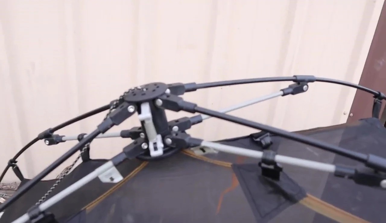 Person demonstrating how easy the tent is to setup.