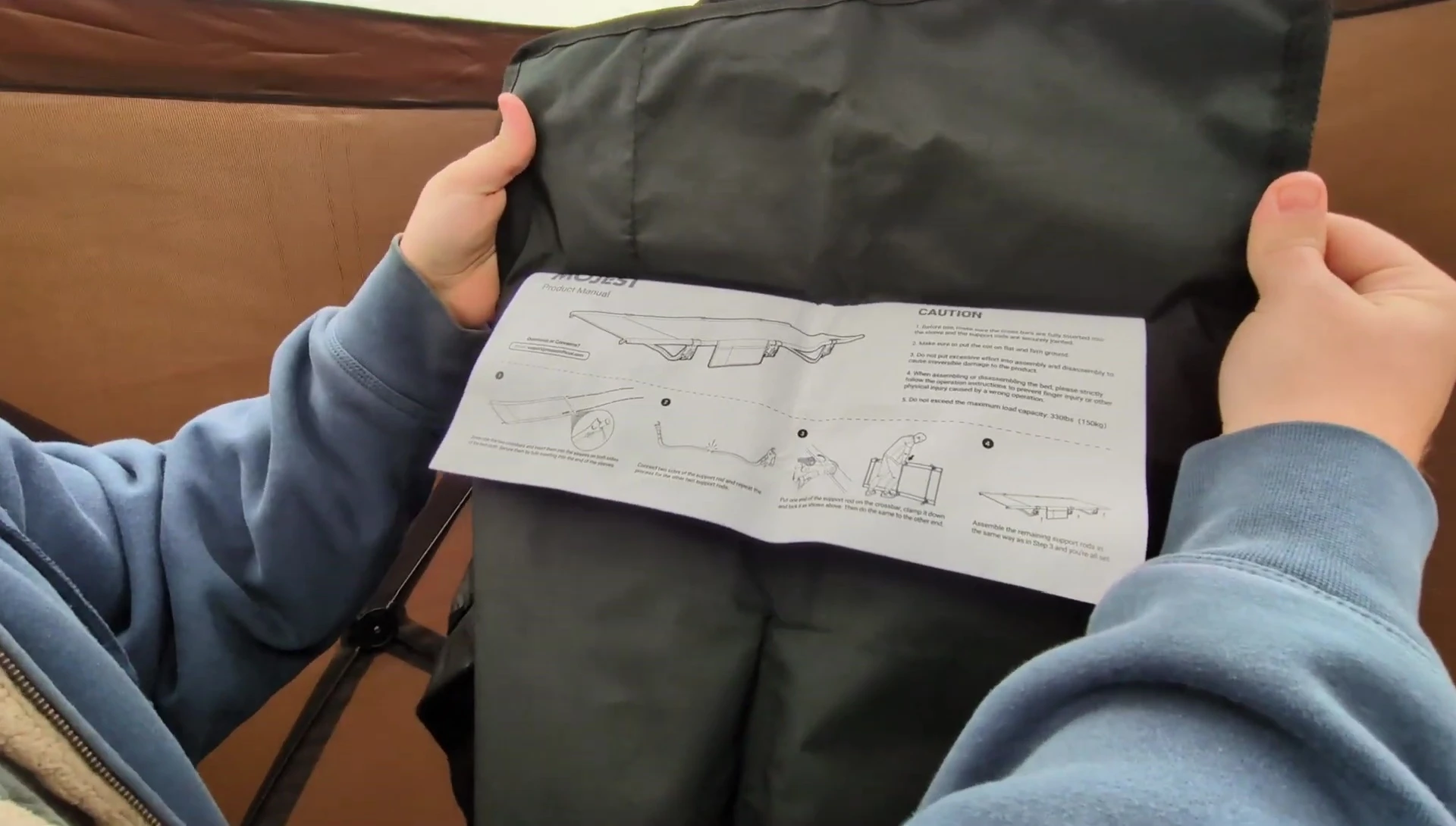 The folded cot demonstrating its compact size