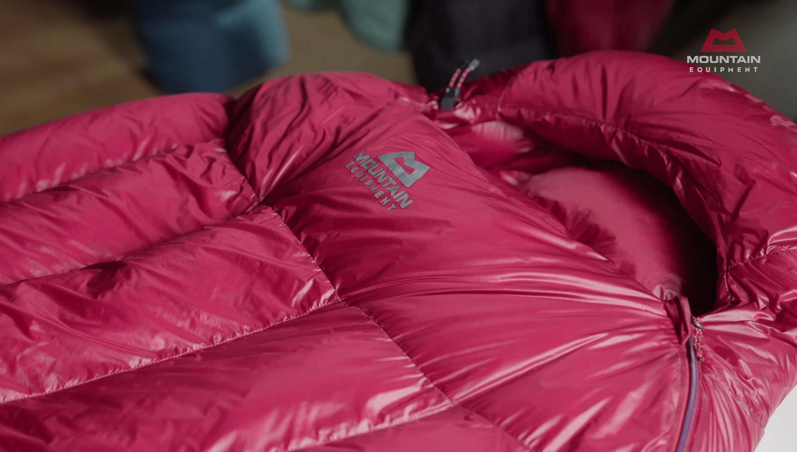 Close-up view of the sleeping bag hood, showcasing its multiple baffles.