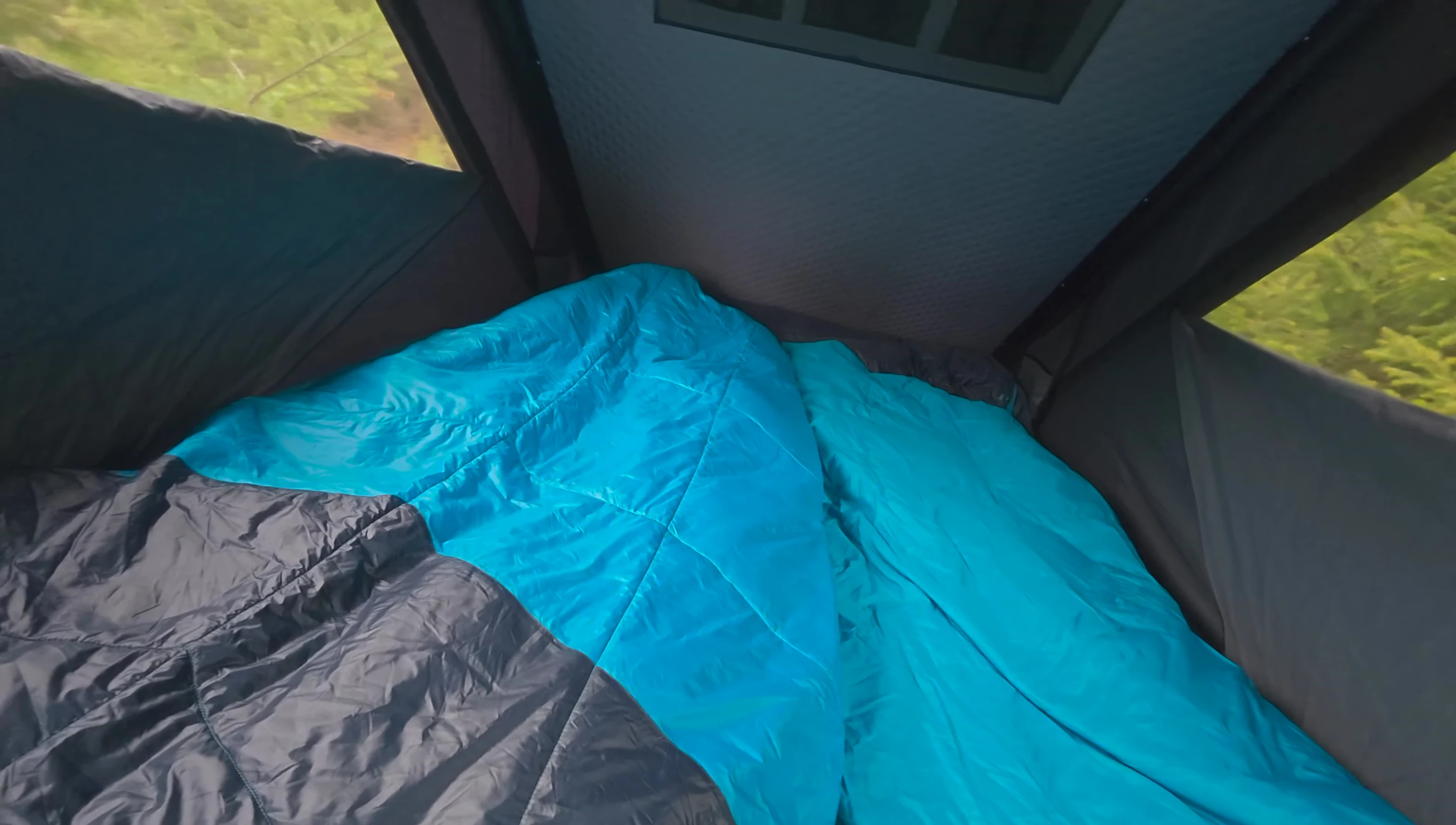 Final comparison shot of both sleeping bags in the tent