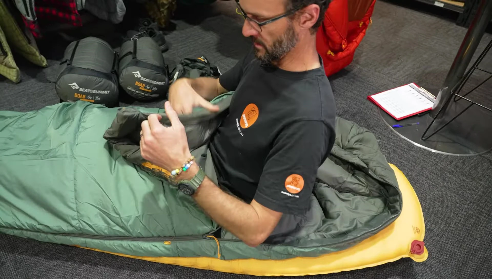Reviewer lying in the sleeping bag.