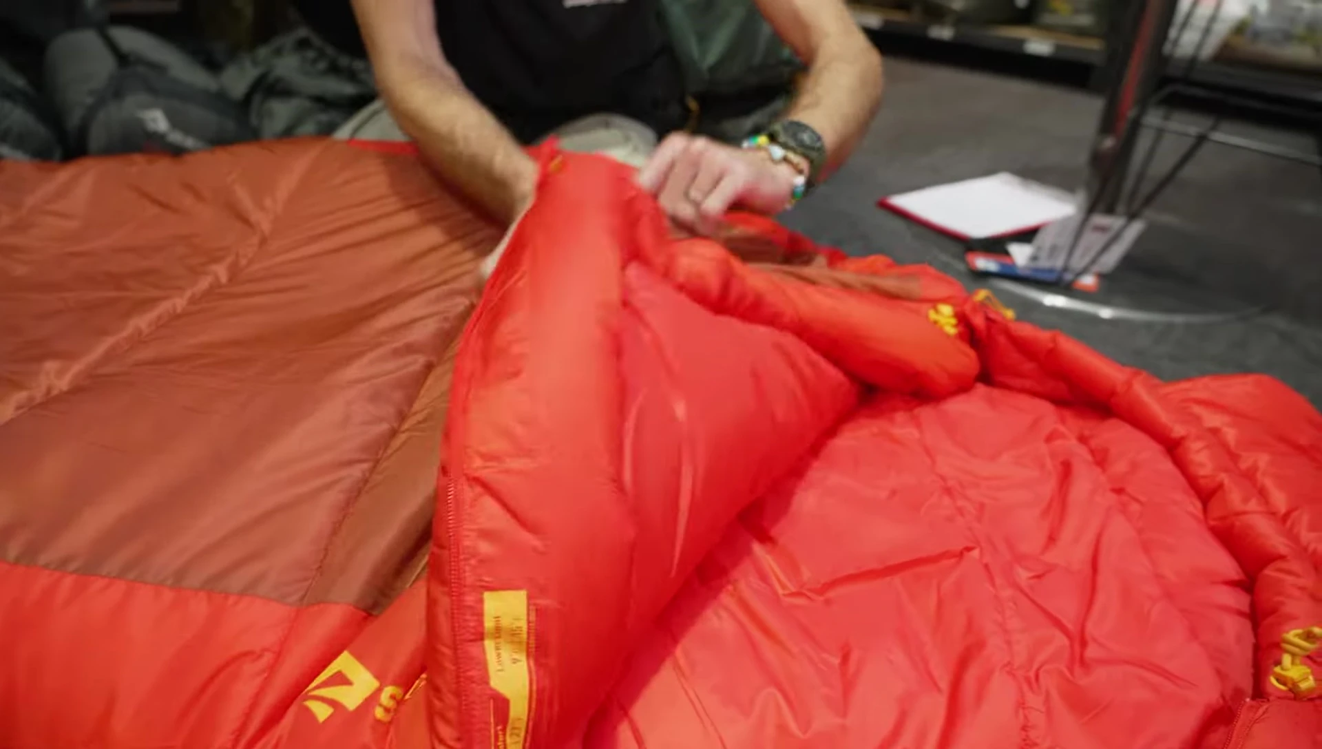 Close-up of the sleeping bag's fabric, highlighting its texture and color.