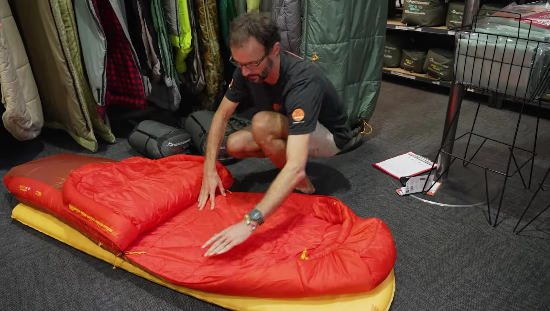 Person demonstrating how to get into the sleeping bag comfortably.