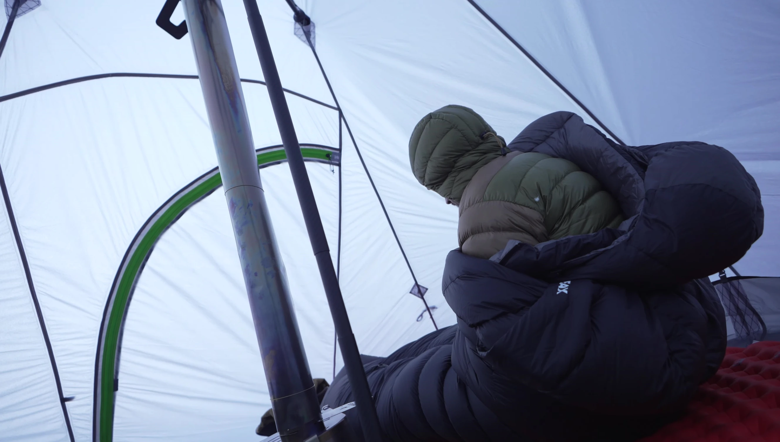 Tester expressing satisfaction with the sleeping bag's warmth.