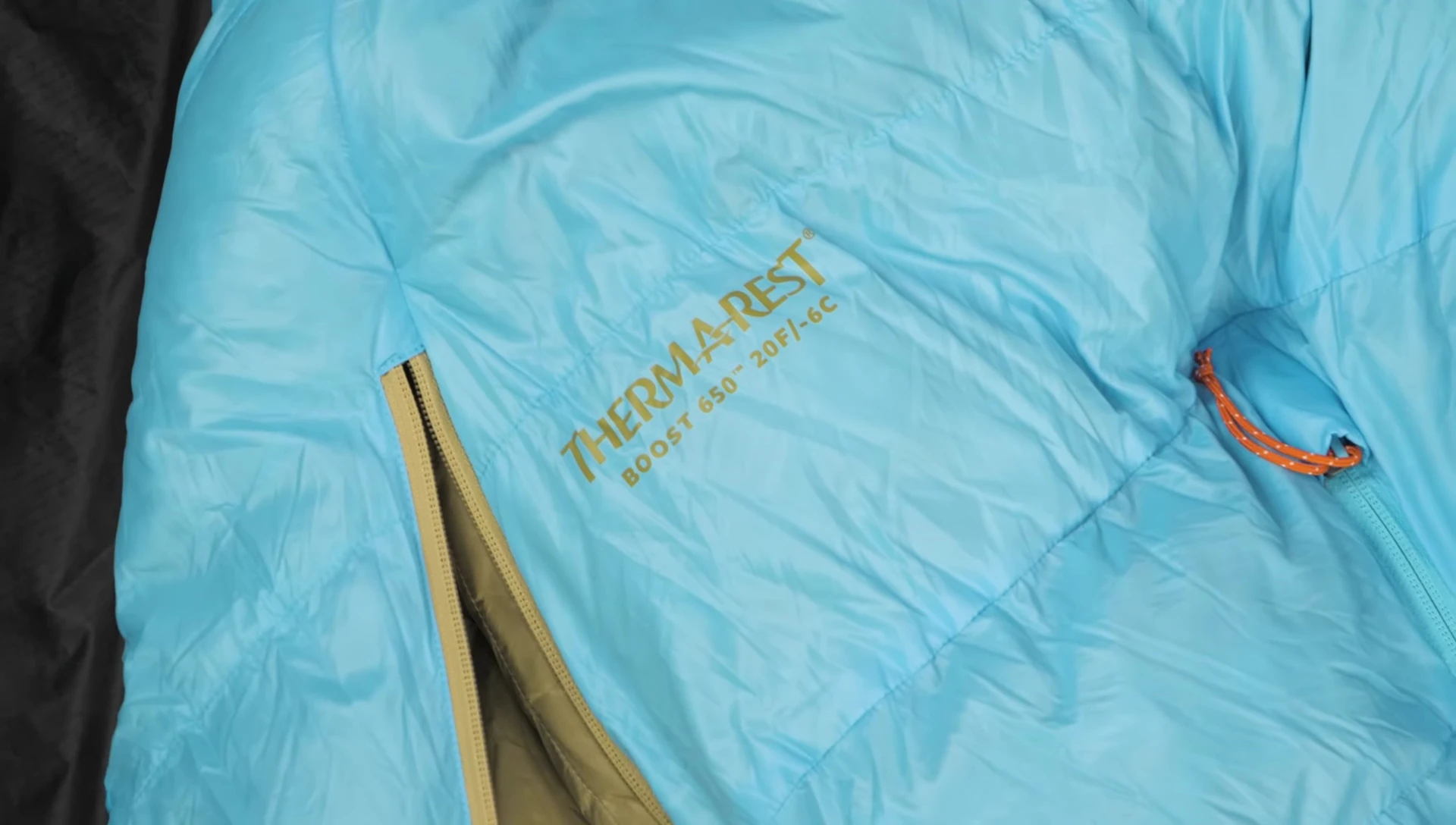 Display of different sizes and temperature ratings of the sleeping bags.