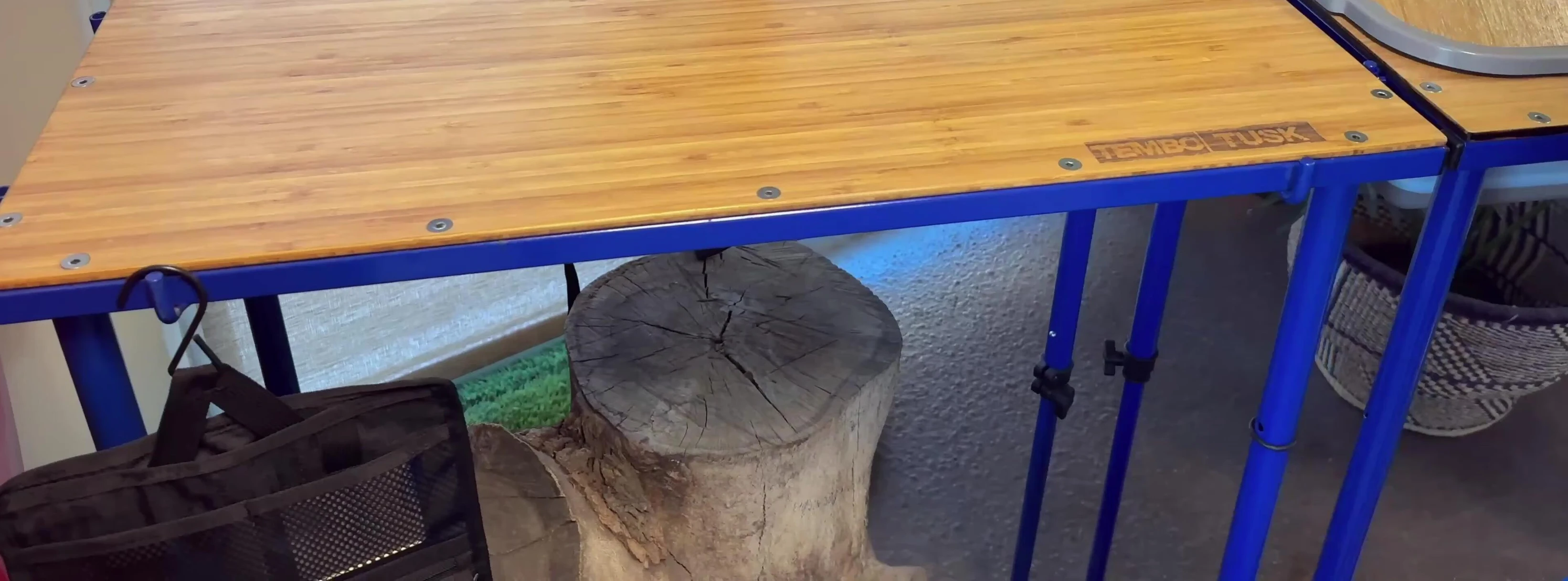 Multiple camp tables linked together