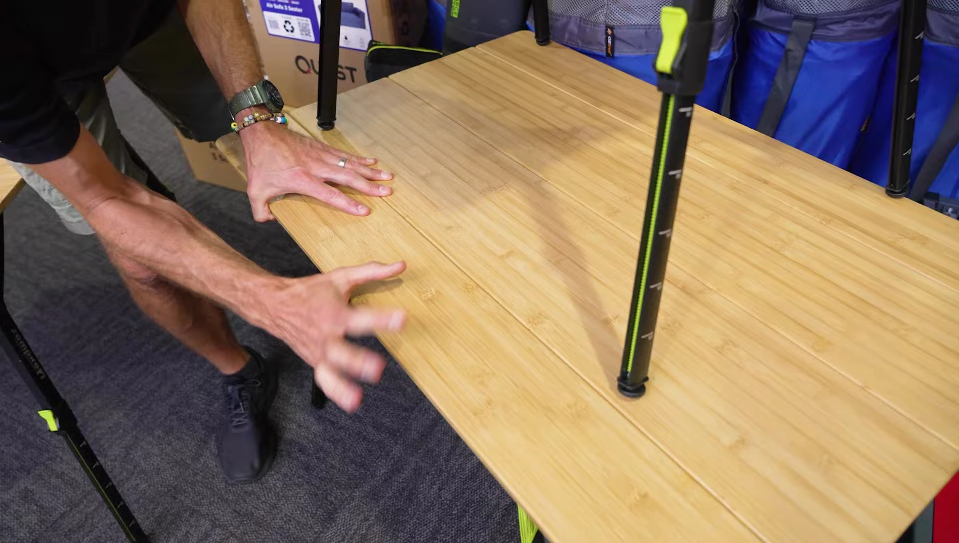 The medium sized table with a chair tucked underneath, illustrating compact use.