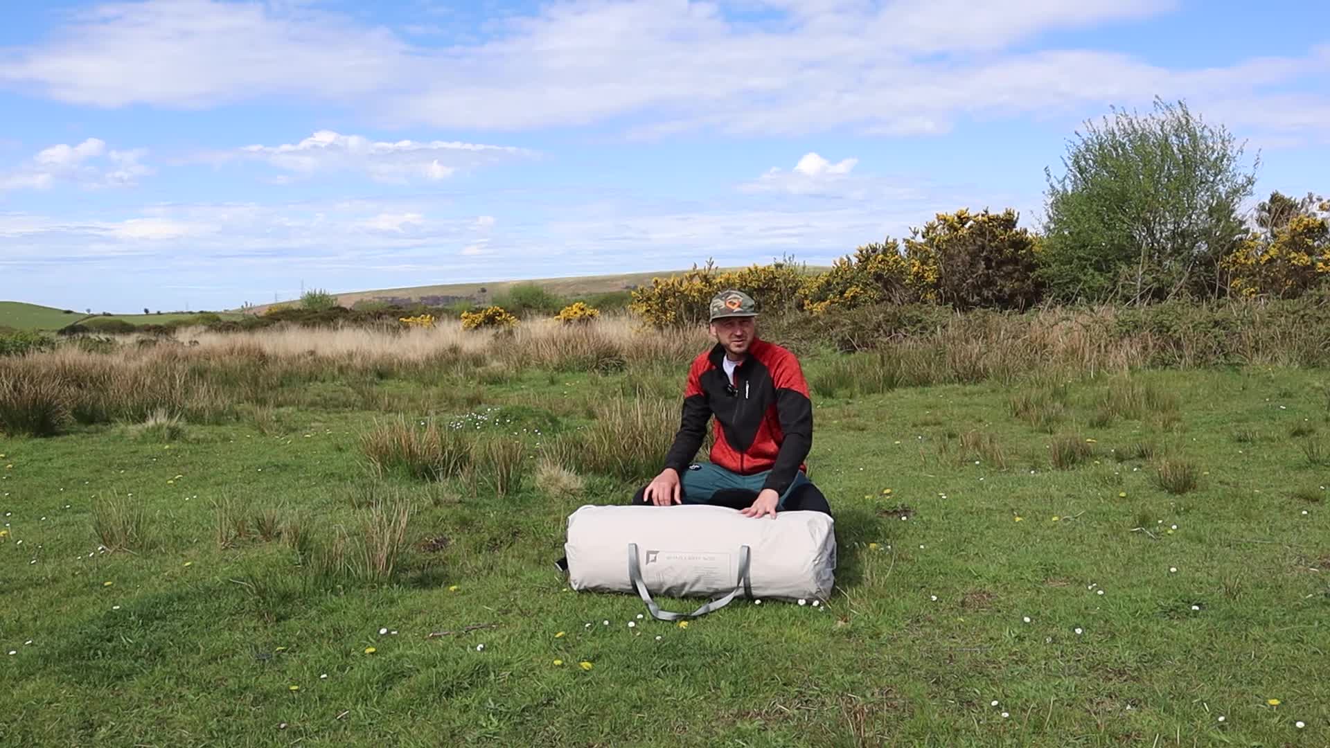 Starting the setup process of the bell tent.