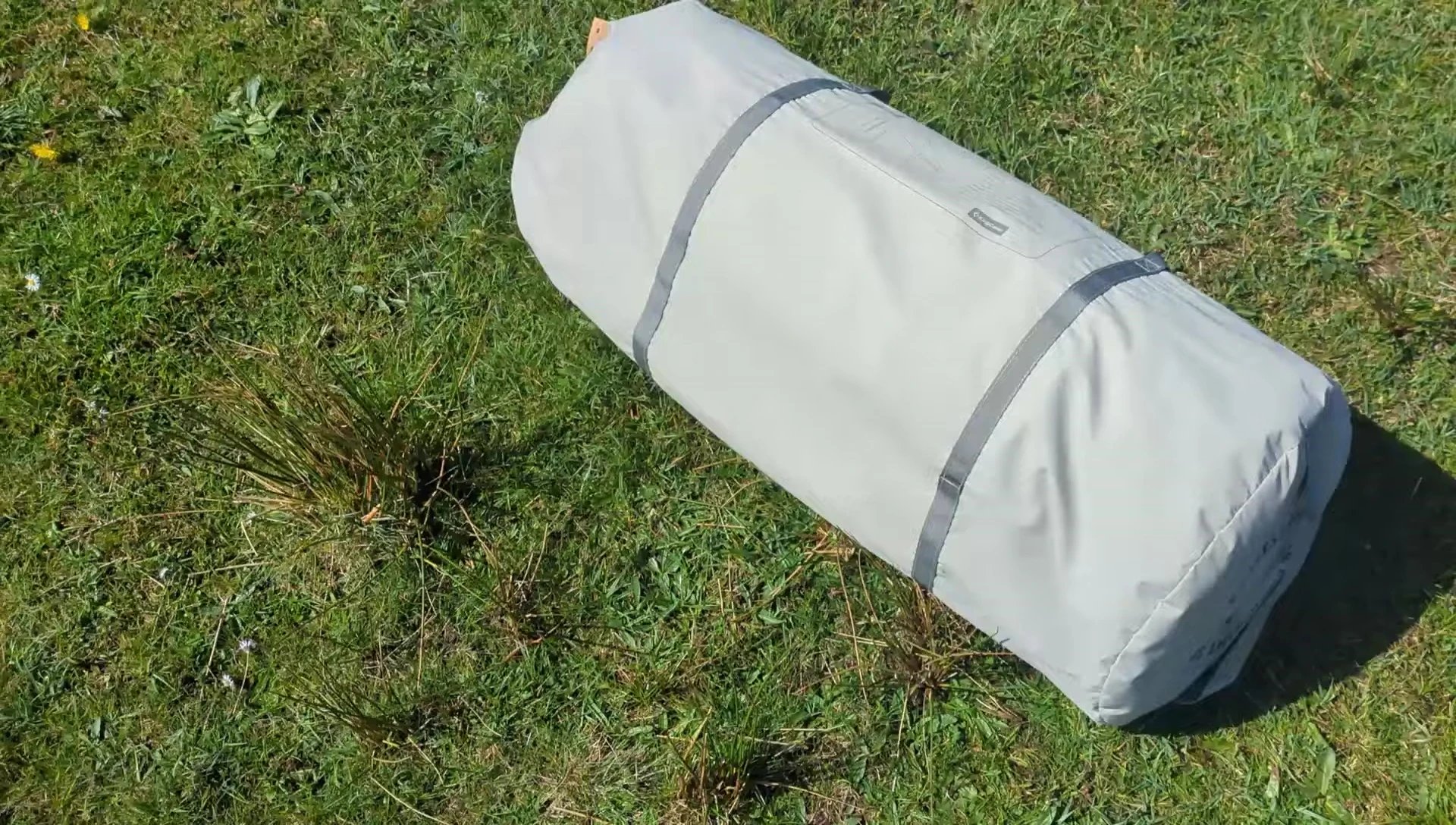 The tent being packed back into the carrying bag easily.