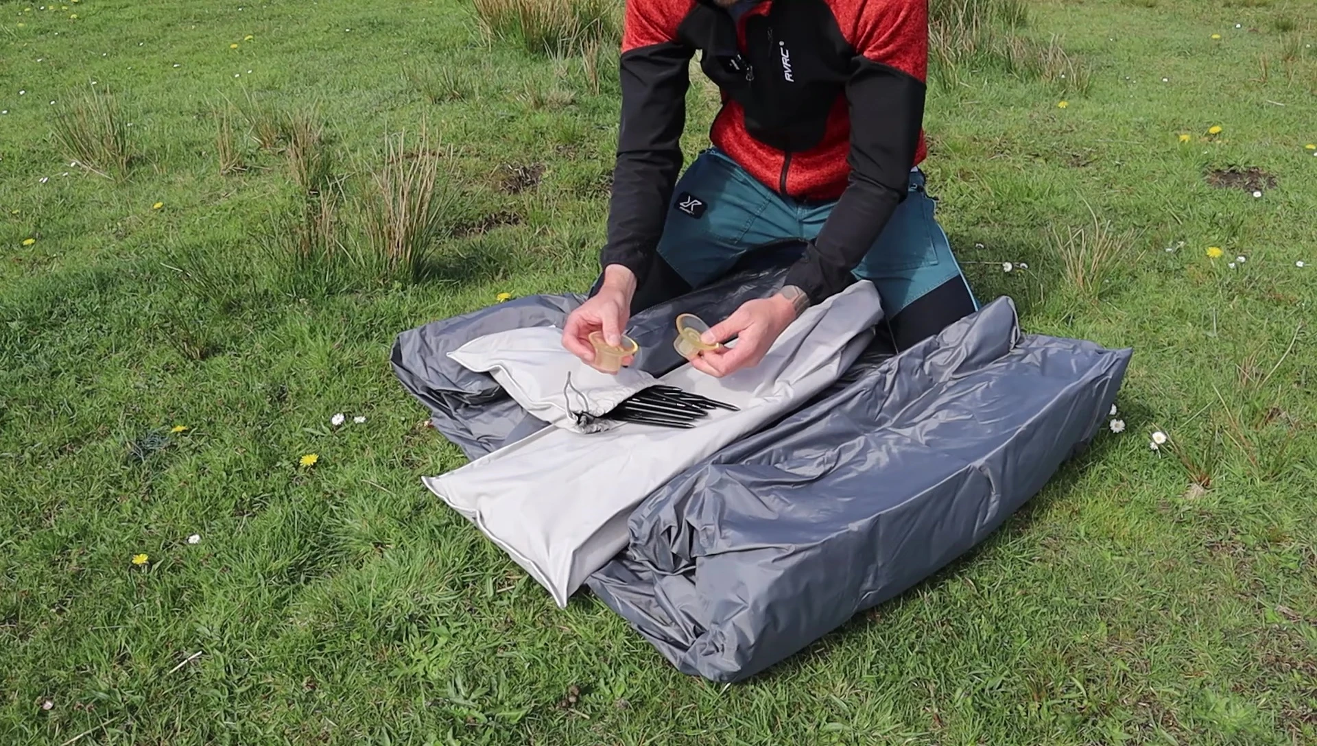 Close-up of the additional bag containing golf tees and other accessories.