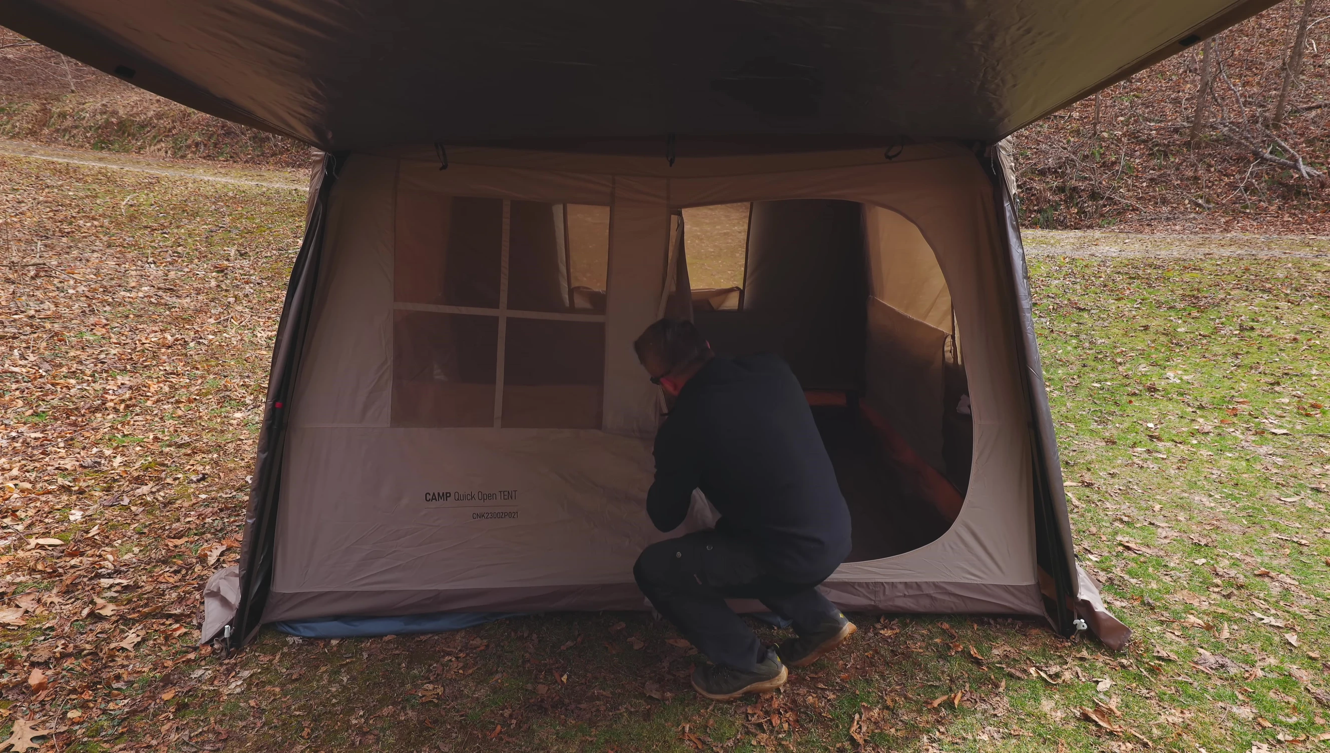 The large door of the tent being opened