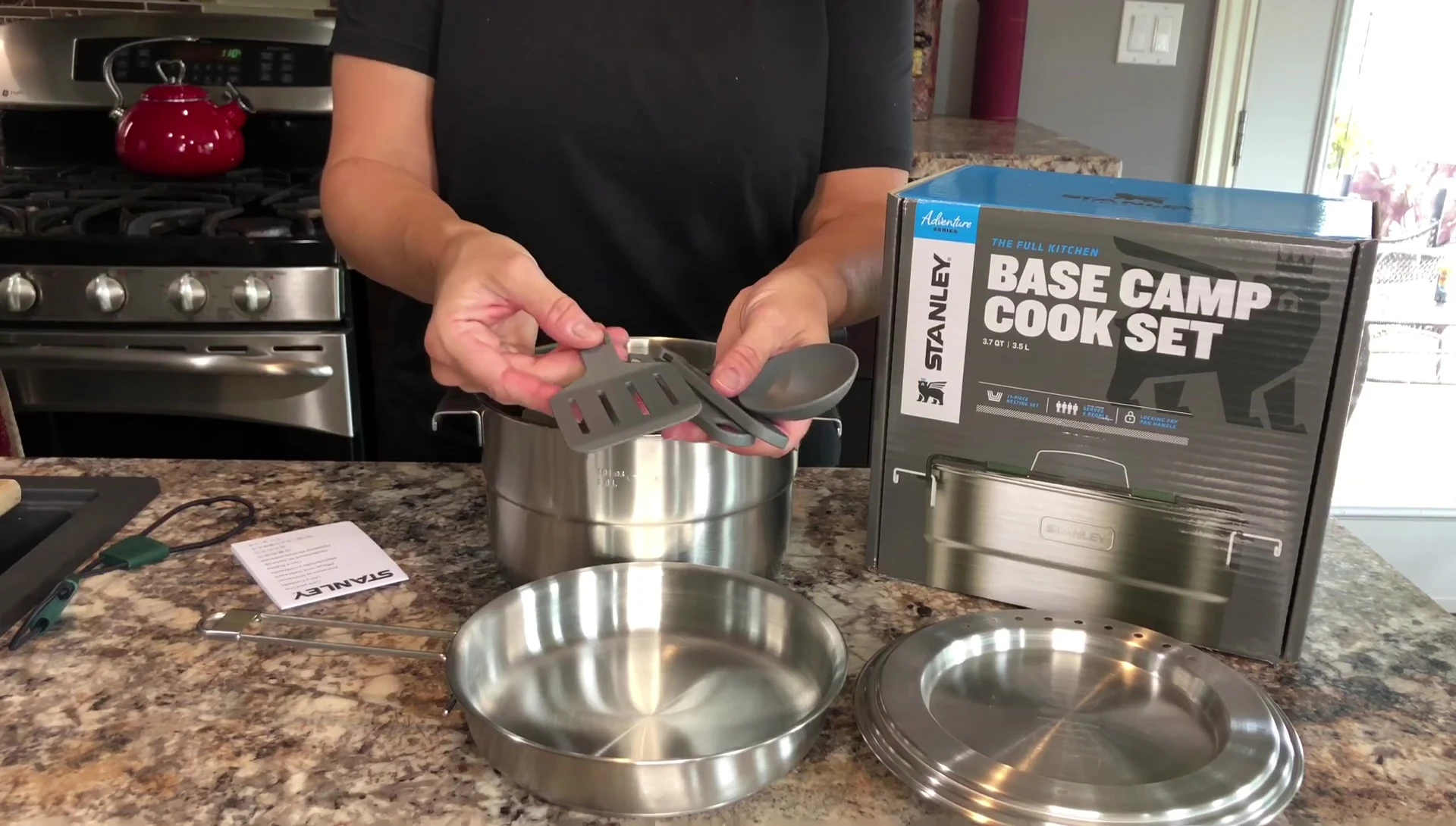 The collapsible utensils shown connected.