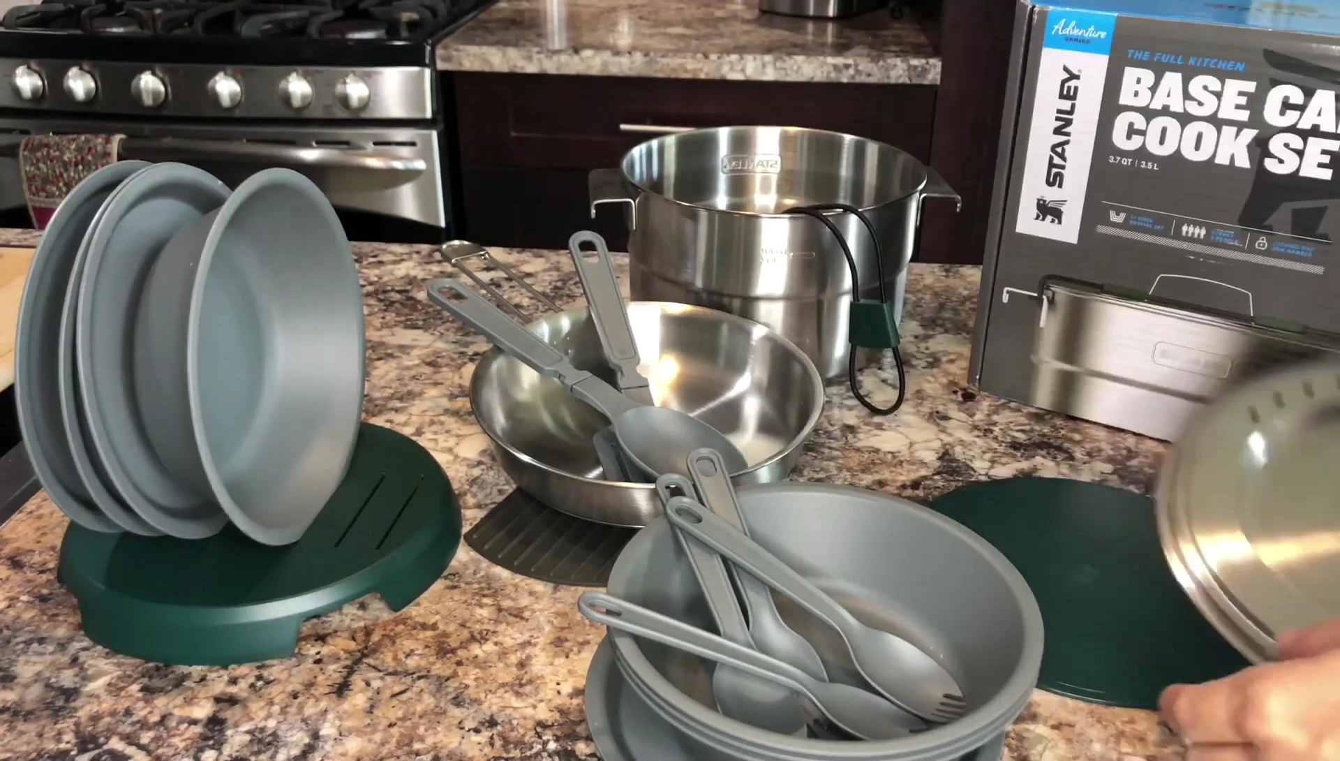 The compact cutting board and locking bungee.