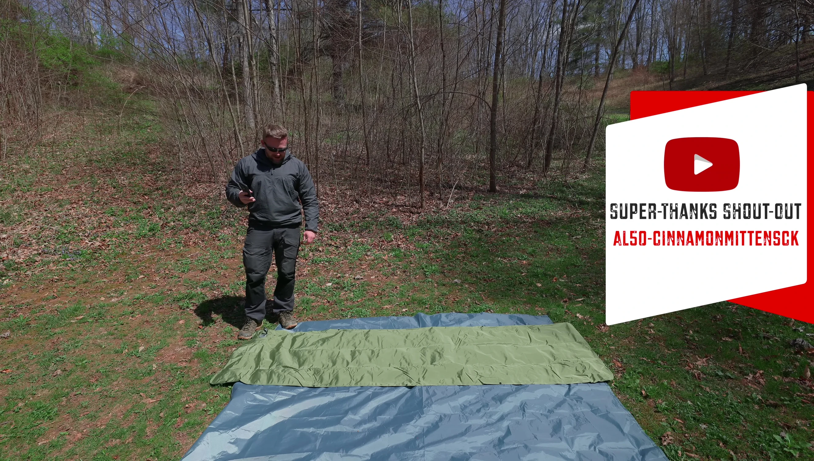 The reviewer starting to inflate the sleeping pad.