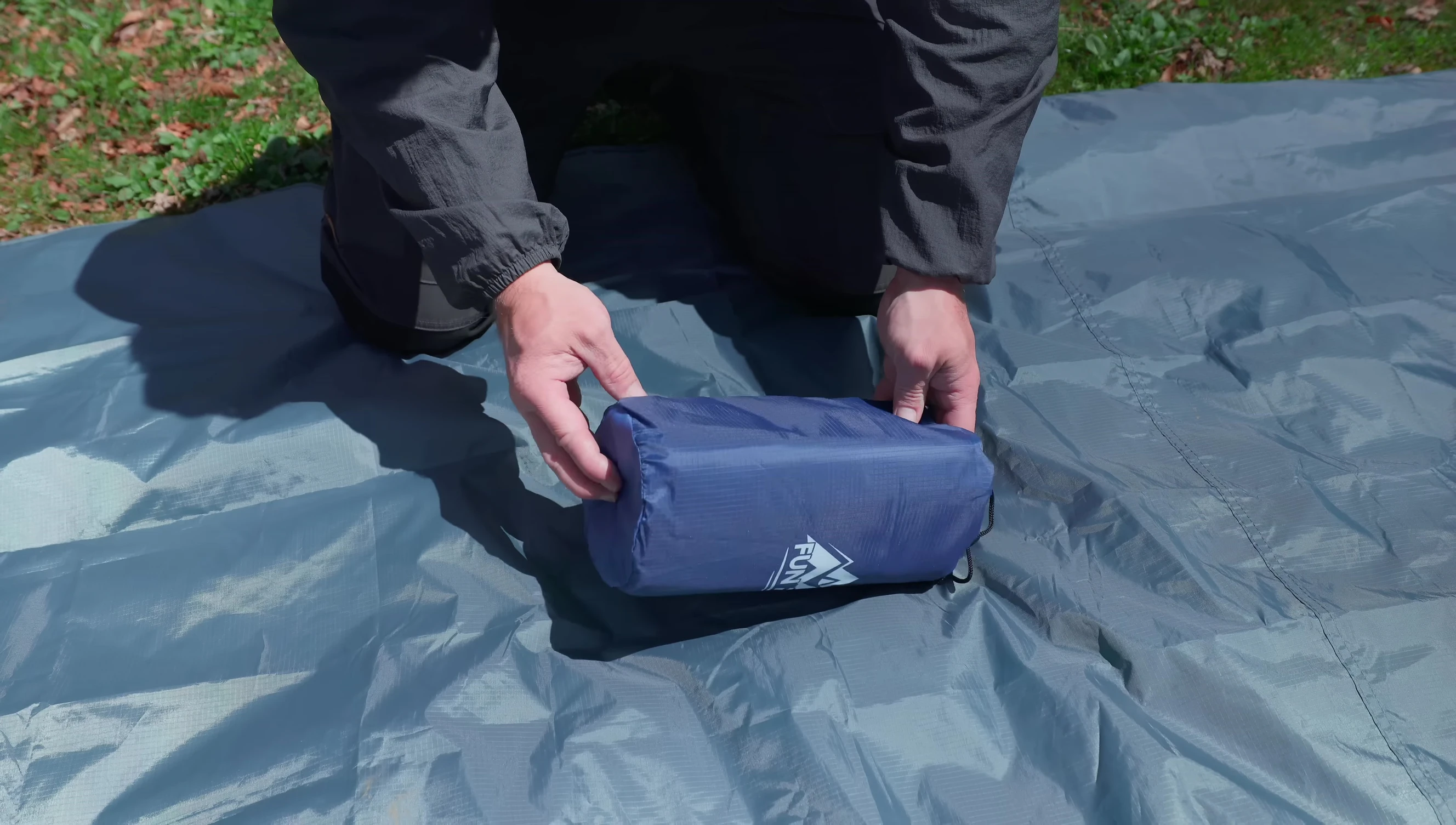 Close-up of the Fun Pak sleeping pad packaging and contents.