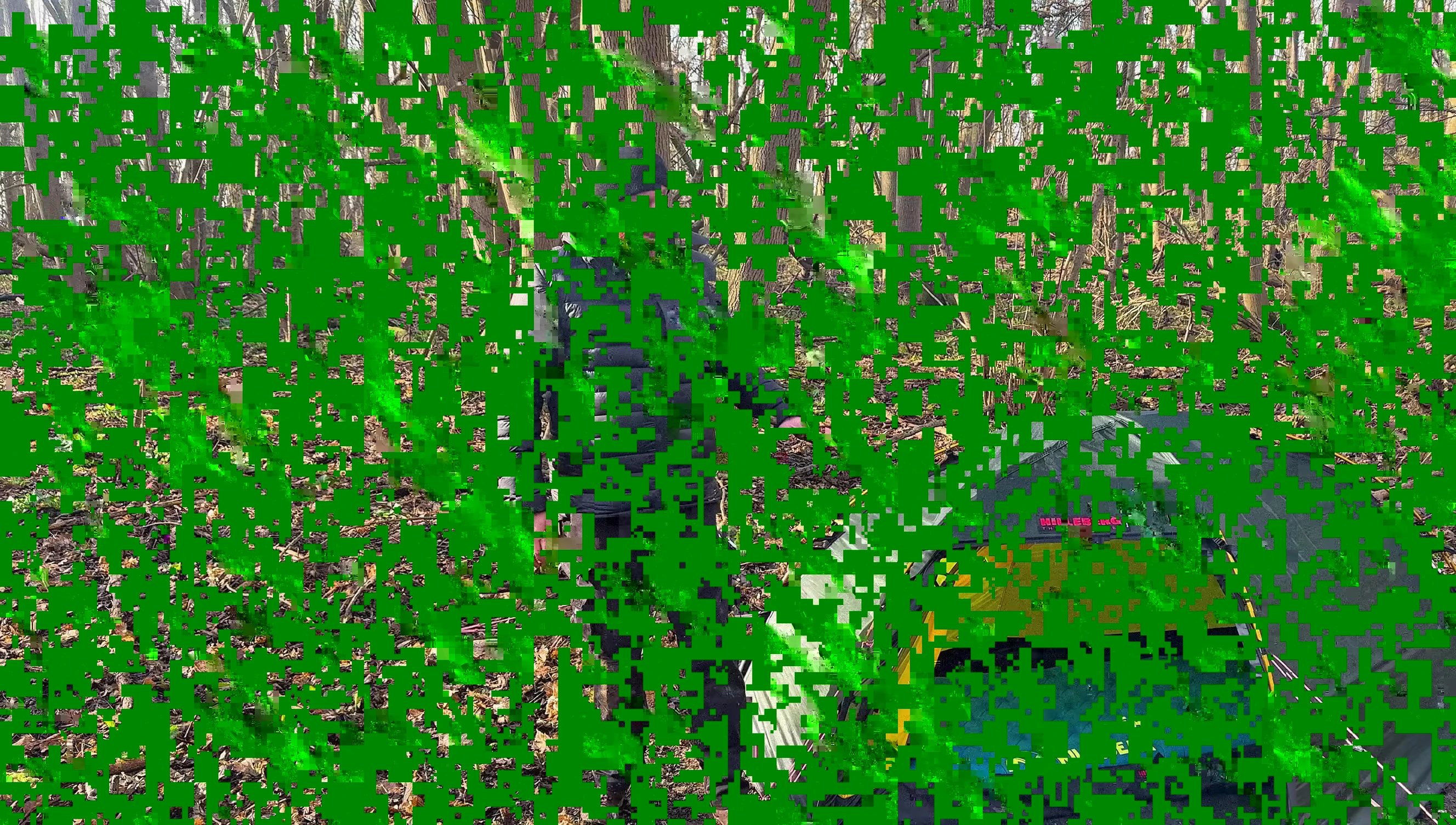 The reviewer highlighting the sleeping pad's thickness