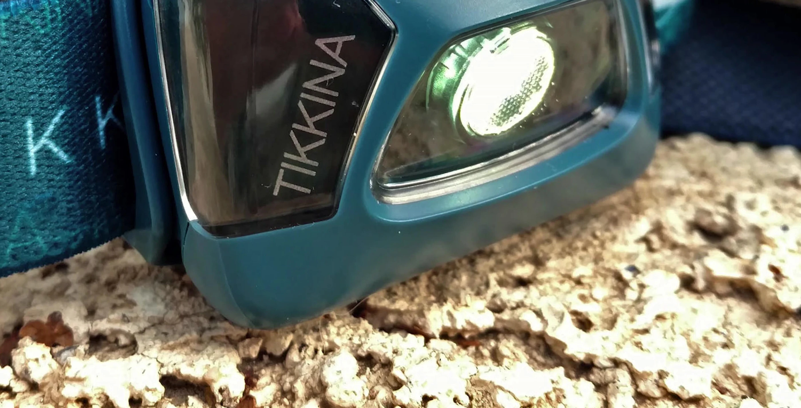 Petzl Tikkina headlamp showing its compact and versatile design.