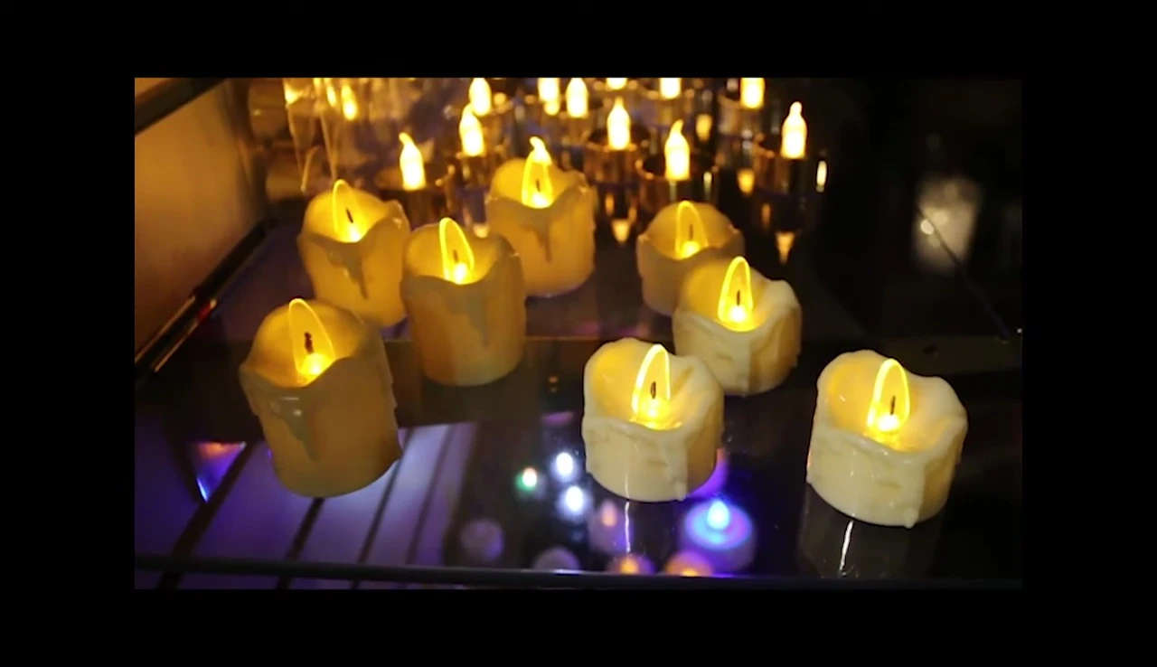 Variety of tea lights and votives arranged together