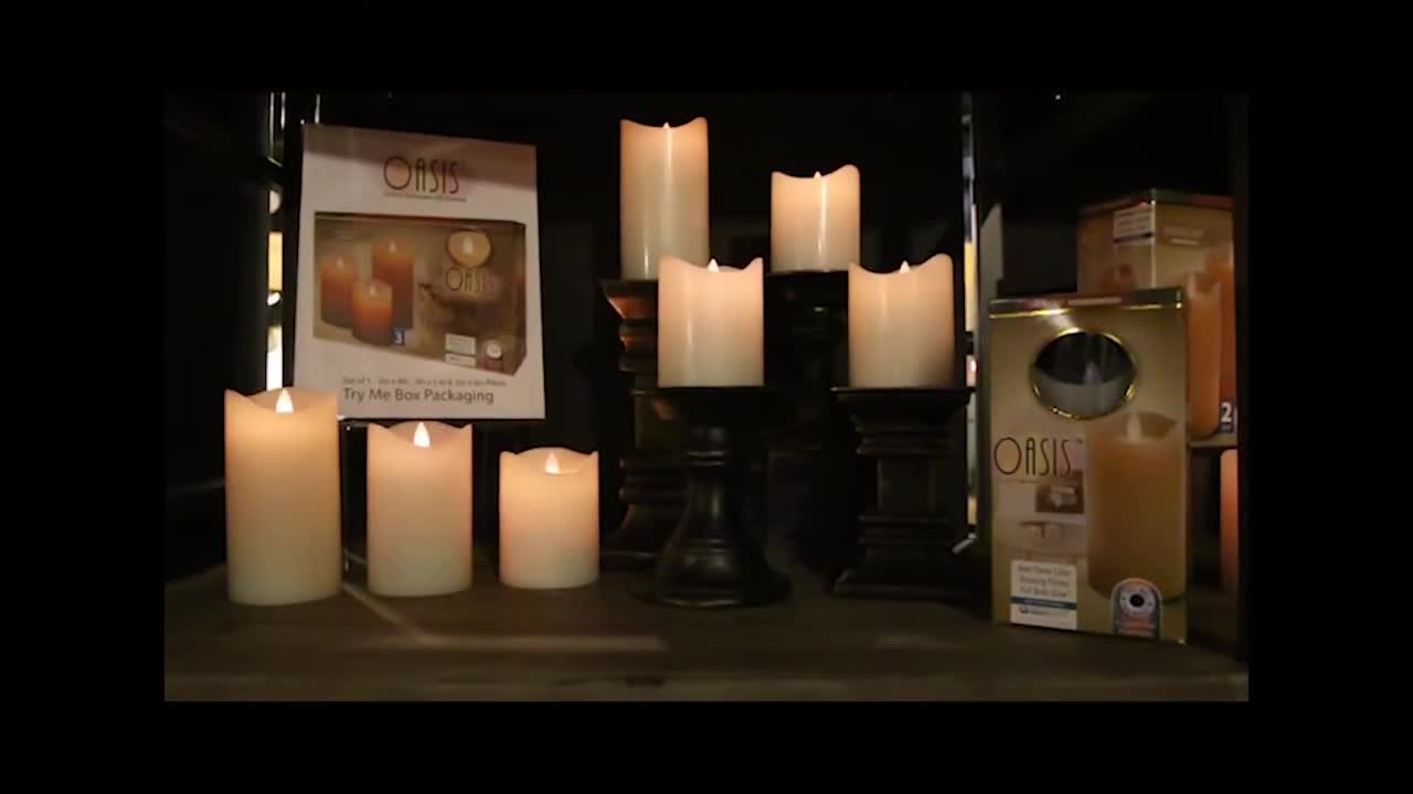 Close-up of the Oasis wax LED candles showcasing their flickering flame