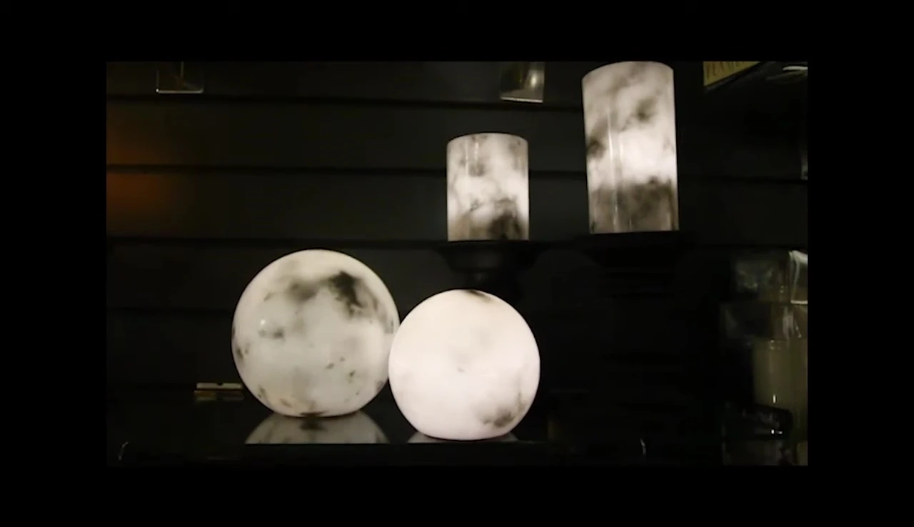 Close-up of the marbled candles and spheres showcasing their unique patterns