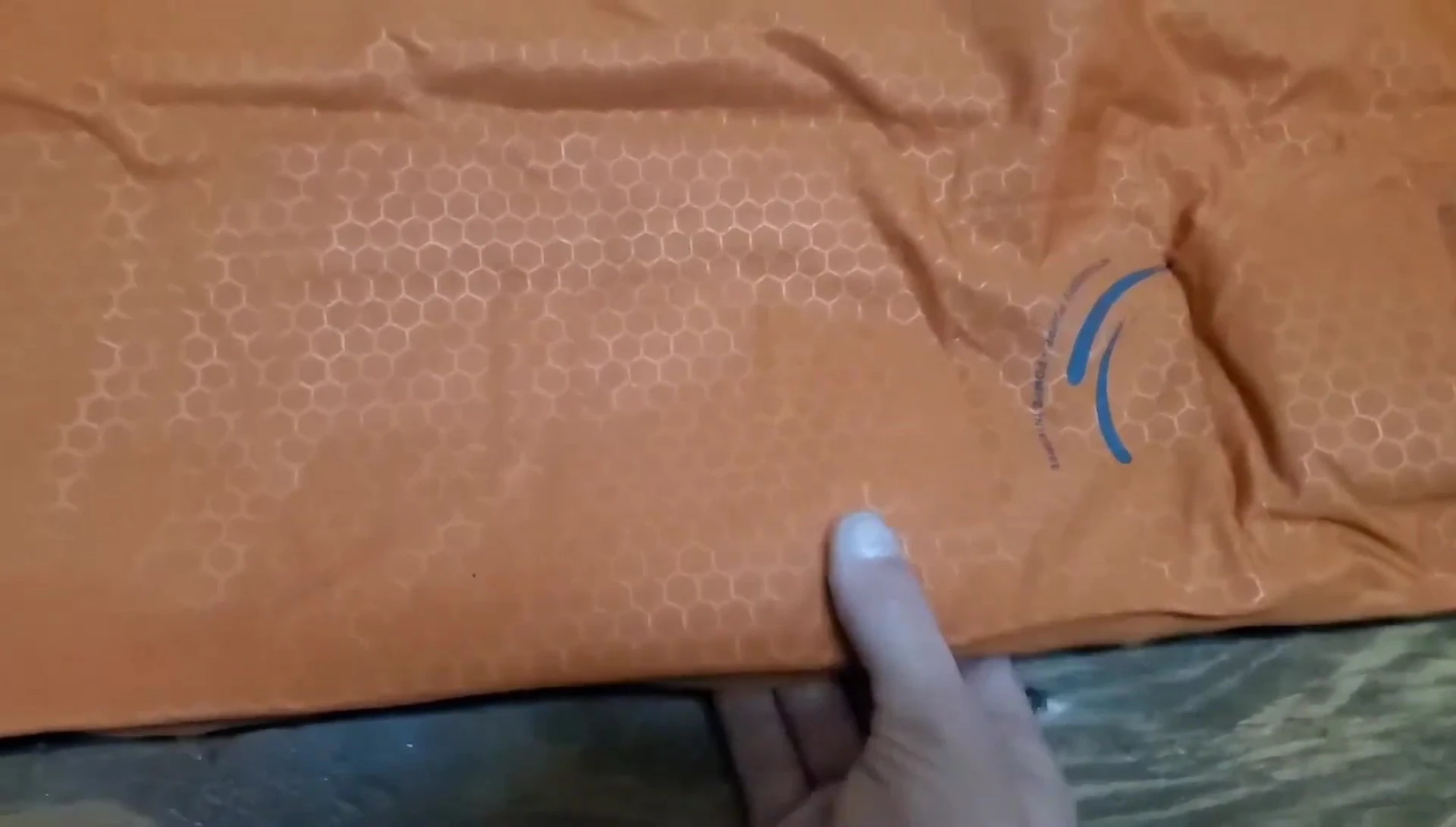 Comparison shot showing the thickness difference between the inflated Exped and Klymit pads.