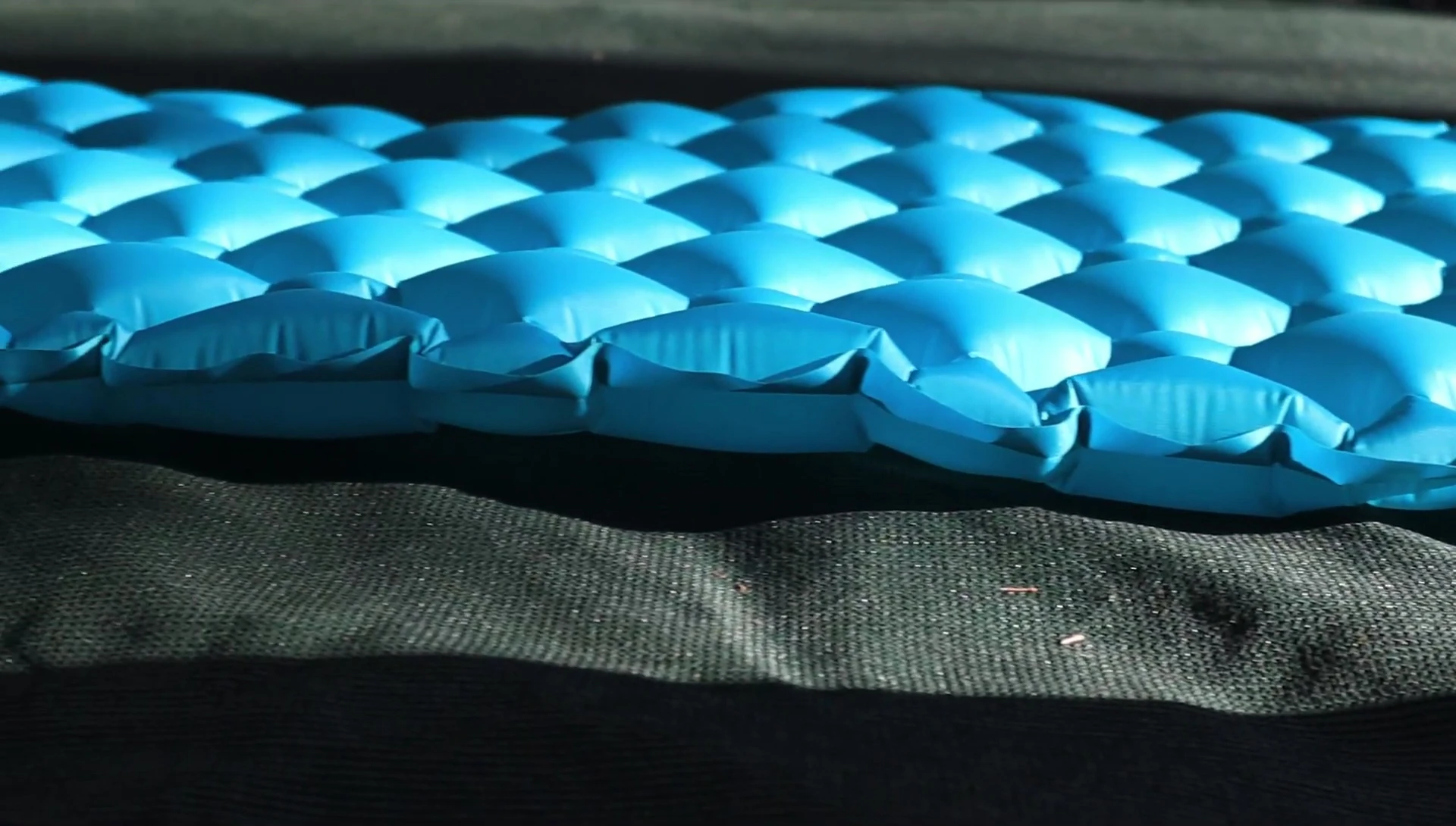 Detail shot comparing the baffle designs of the two sleeping pads.
