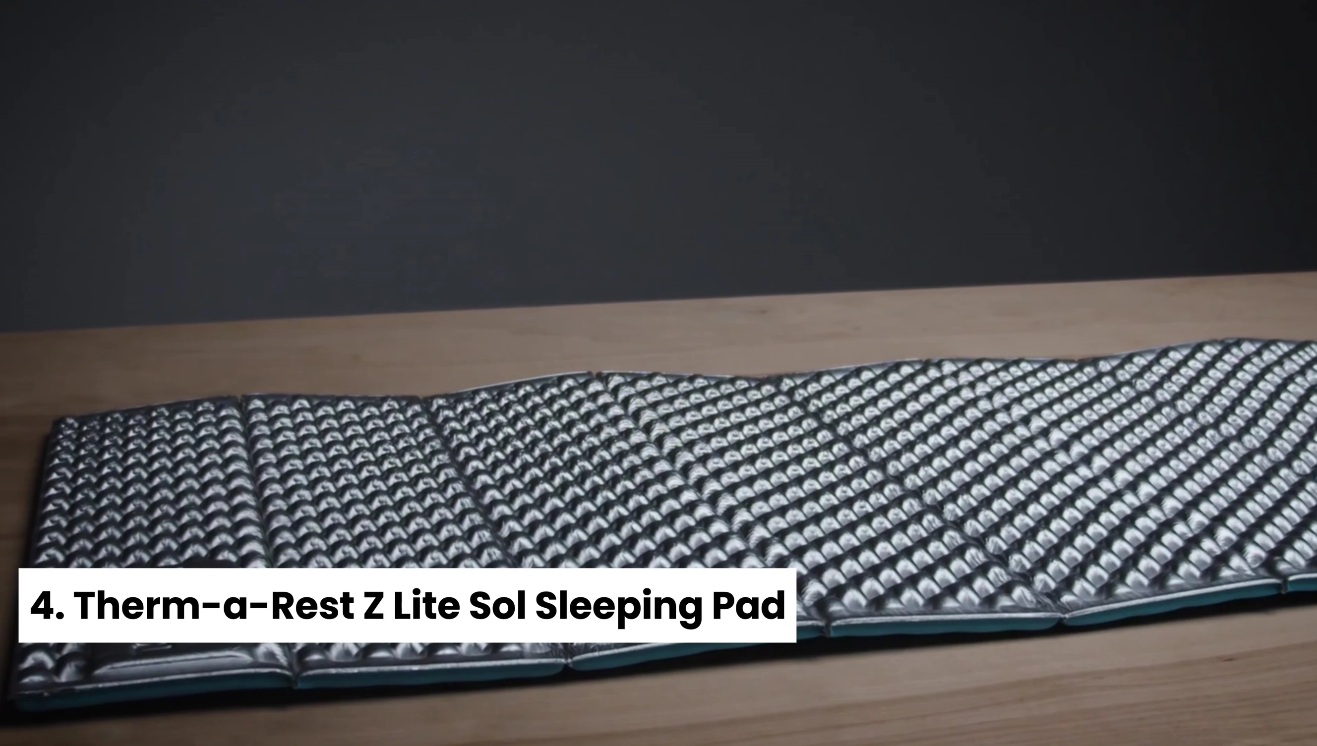The Therm-a-Rest Z Lite Sol backpacking sleeping pad shown partially rolled.