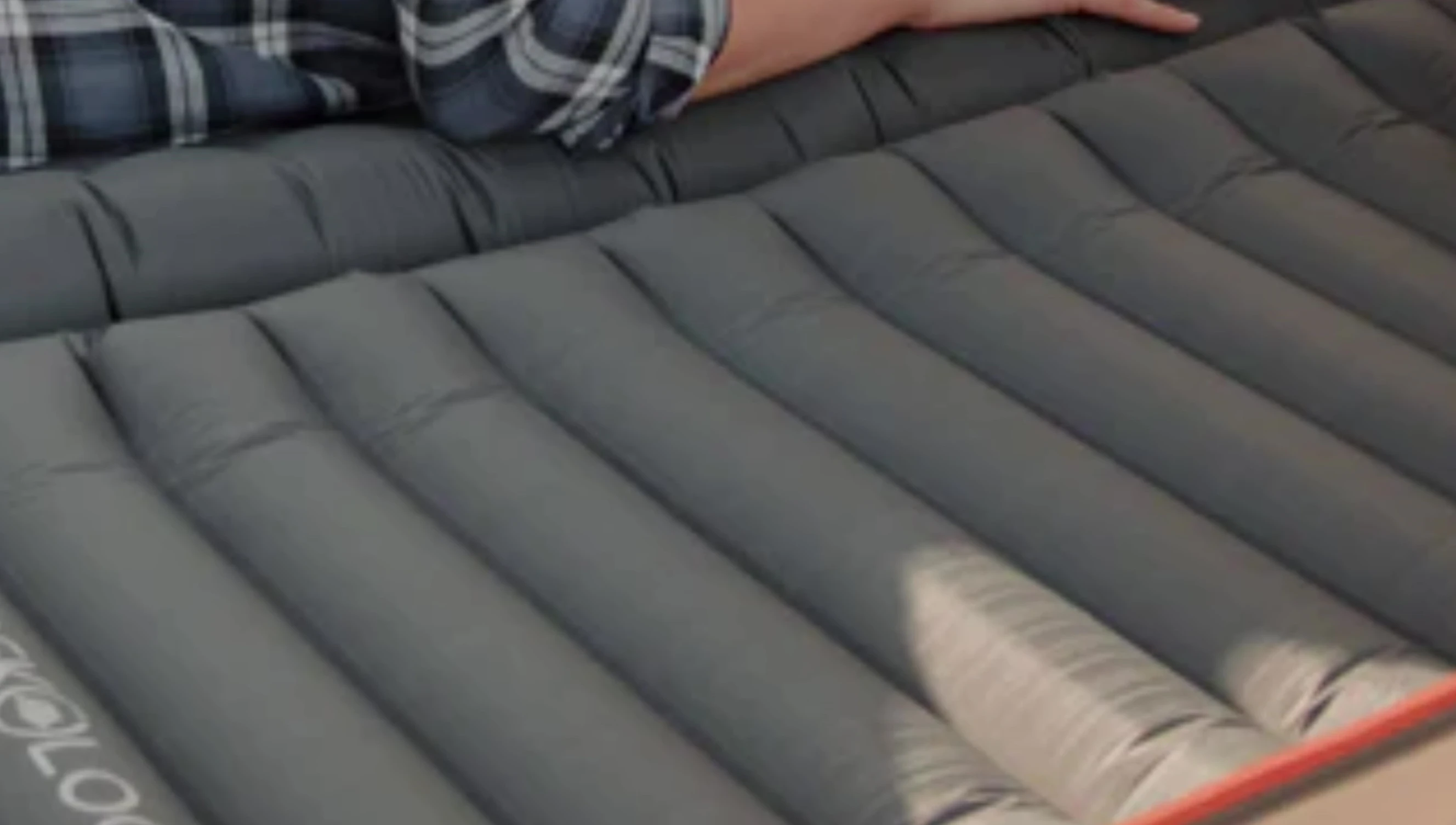 The Trilogy pad fully inflated, showcasing its size and integrated pillow.