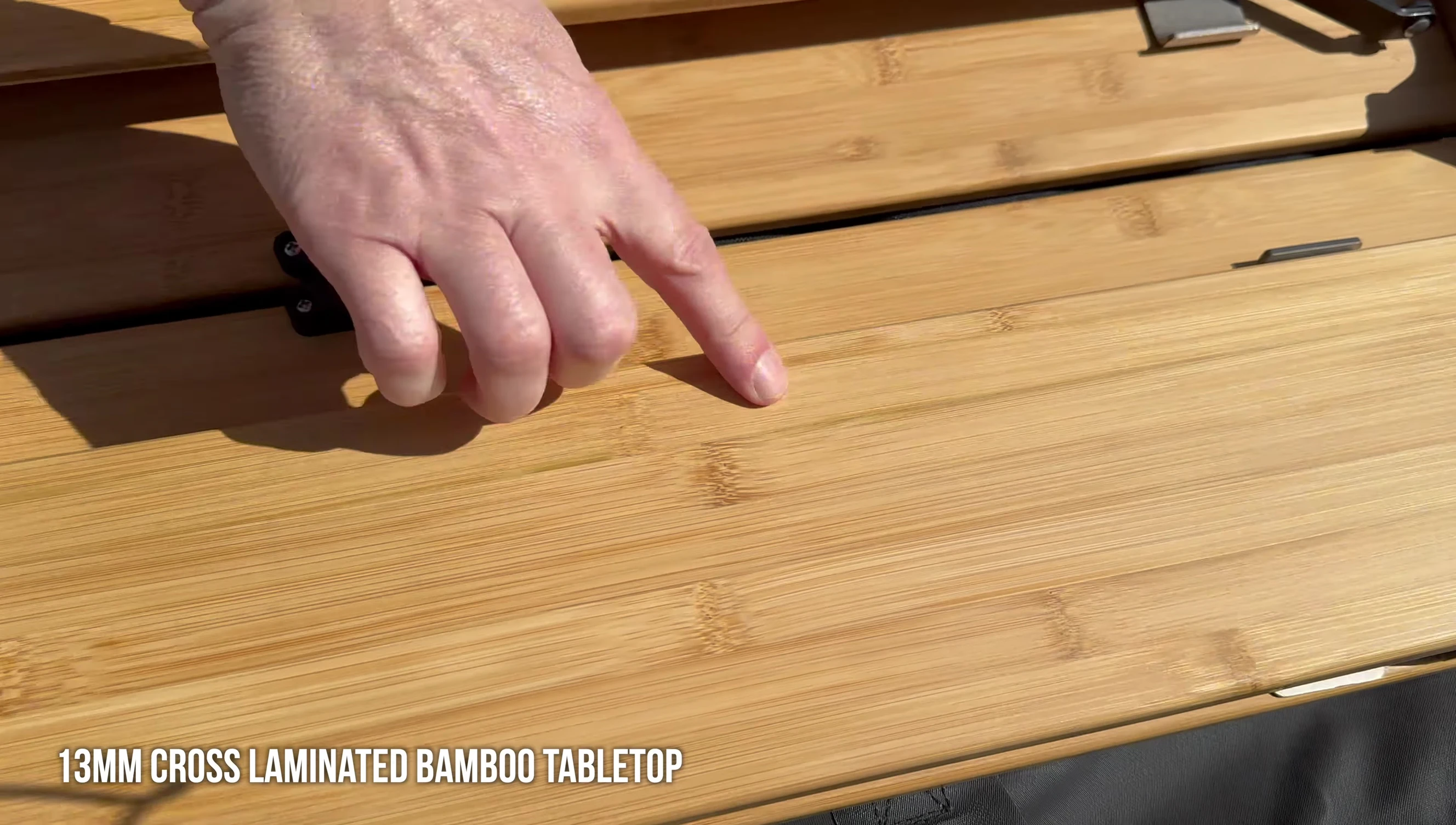 Close-up of the bamboo tabletop and folding design.