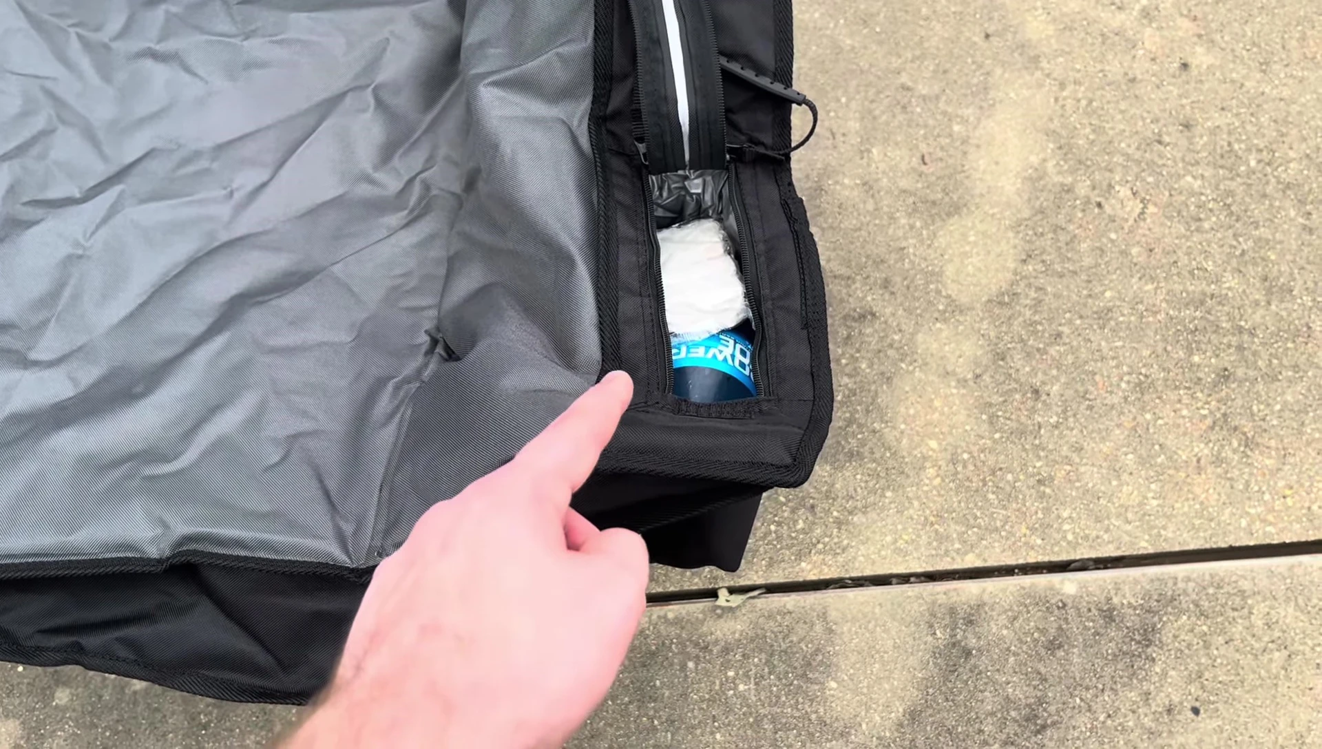 Two water bottles in the side pocket.