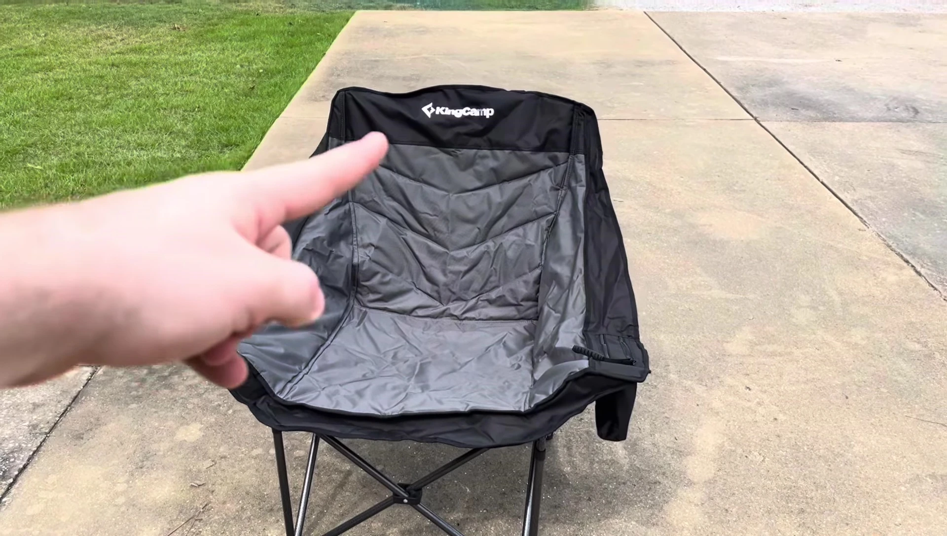 Close-up of the KingCamp branding on the chair.