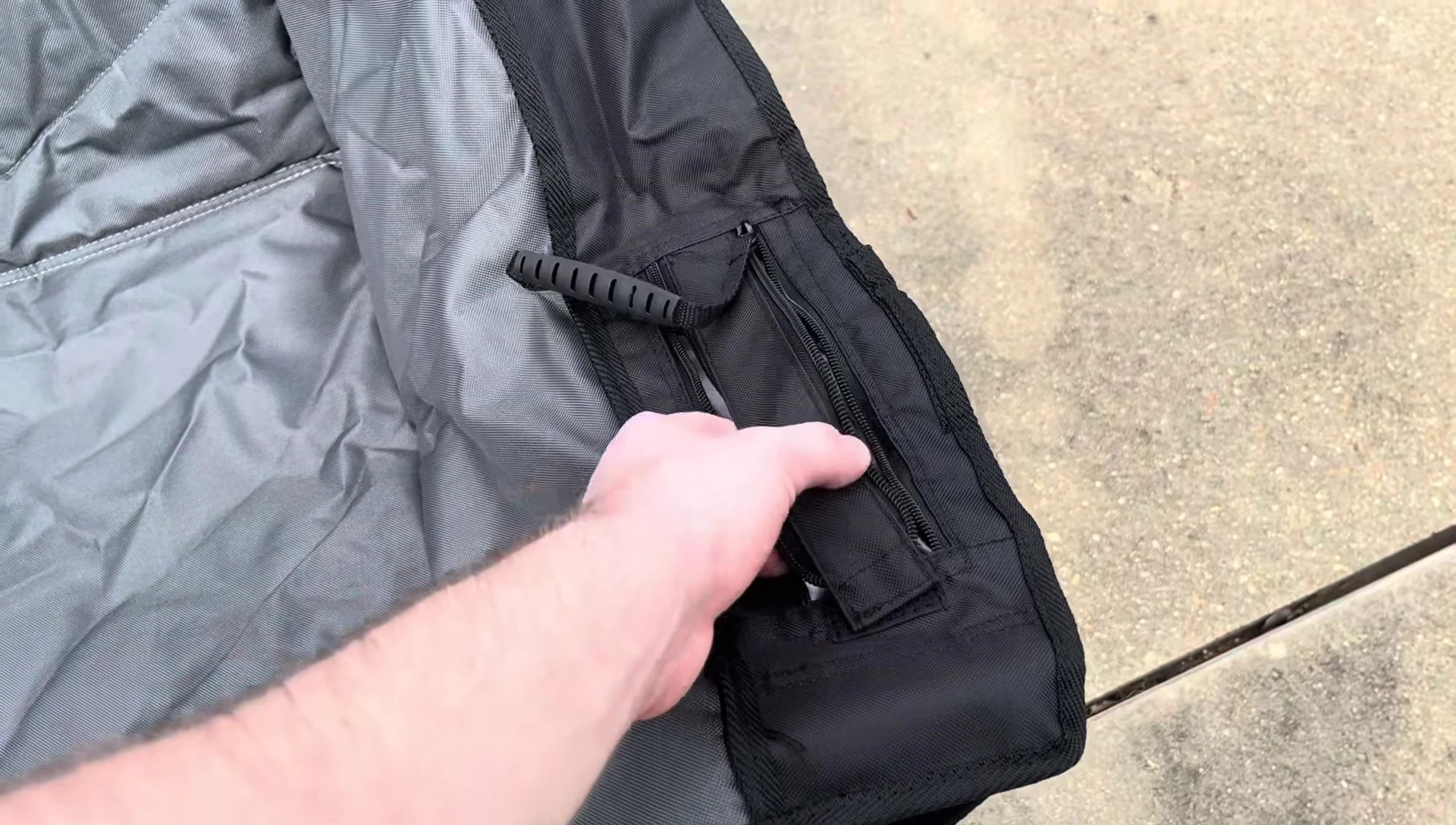 The zipped compartment for snacks and other small items.