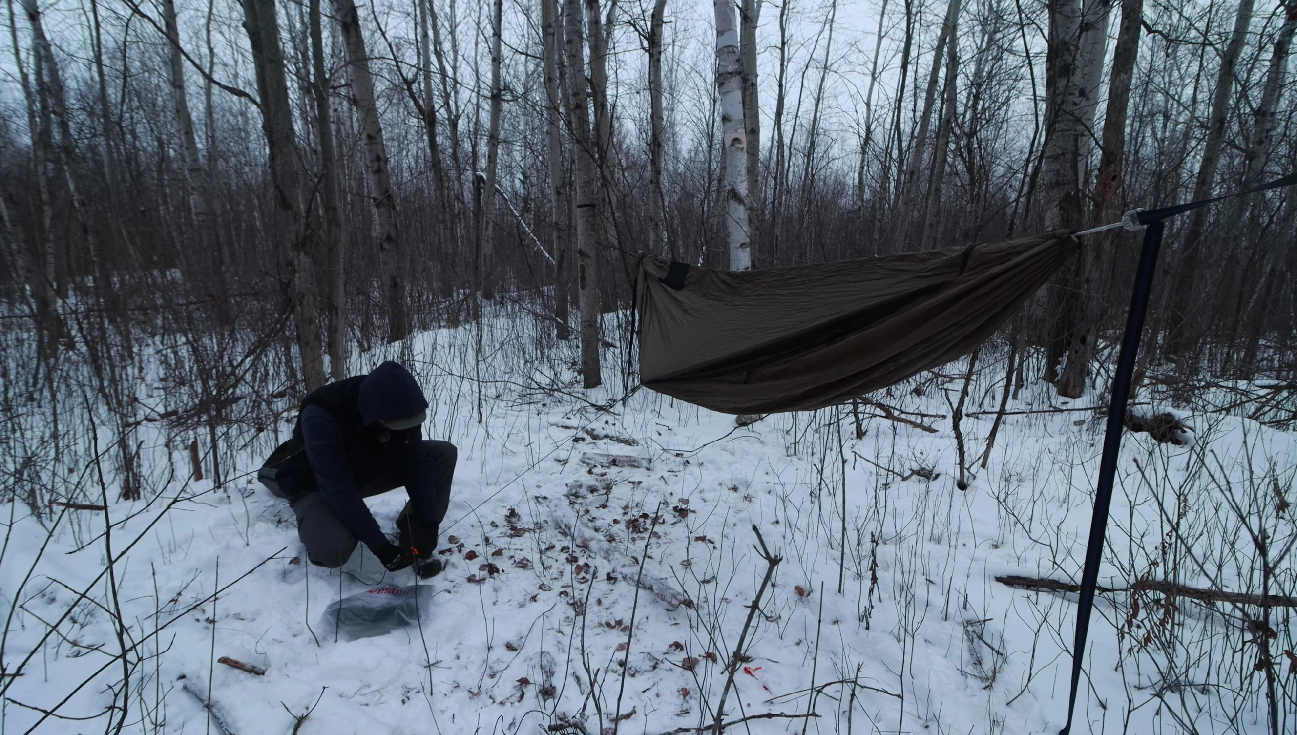 The 25-inch sleeping pad comfortably fitting inside the hammock.